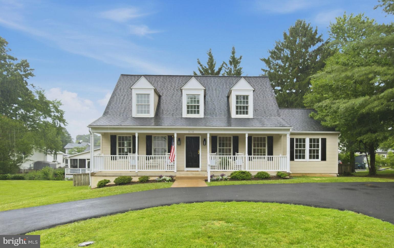 Welcome home to this charming Cape Cod nestled in the heart of Purcellville!  As you approach the home, the charming front porch, complete with space for rocking chairs, welcomes and invites you to slow down and enjoy the simple pleasures of small-town living.

Offering the ease of main-level living, this recently refreshed 3-bedroom, 2 full and 1 half-bath home combines comfort, convenience, and small-town charm.

Step inside to find fresh paint throughout, new carpet, updated lighting fixtures, and an open yet warm and inviting floor plan with flexible living spaces. The spacious main-level primary suite is complete with an en-suite bath featuring both a soaking tub and a separate shower. The Primary bathroom has been recently updated with new flooring. Upstairs, you will find two generously sized bedrooms and an additional full bath, also featuring new flooring, creating the ideal layout for family, guests, hobbies, or a home office.

The large kitchen, complete with an island, offers plenty of space for dining and has been thoughtfully updated with new Stainless Steel appliances, refreshed hardware and updated lighting. From the kitchen, step outside to discover a fully fenced backyard, offering enough space for gardening, entertaining, or your four-legged companions to roam, without overwhelming upkeep.

The expansive unfinished basement, approximately 1,400 square feet, per Loudoun County tax records, includes a rough-in for plumbing and a walk-up exit, offering endless possibilities! Create the recreation room, home gym, guest suite, workshop, or additional living space you've always wanted.  The home also has a whole house generator.

Ideally located within walking distance of historic downtown Purcellville, you'll enjoy easy access to local shops, restaurants, community events, the Carver Senior Center, the Purcellville Community Center, and the highly anticipated Western Loudoun Recreation Complex, featuring an indoor swimming pool, fitness center, indoor running track, outdoor walking paths, and so much more!

Beyond town, enjoy being just minutes from grocery stores, restaurants, wineries, breweries, hiking trails, the Franklin Park Arts Center, the W&OD Trail, and Route 7 for an easy commute.

Additional updates just completed include a new asphalt driveway (2026), freshly painted front door and front shutters (2026), new carpet (2026), fresh interior paint (2026), new lighting fixtures (2026), new flooring in both full bathrooms (2026), new stainless steel appliances (2026), and updated kitchen hardware. Major systems include a roof replaced in 2020 and a water heater installed in 2019.  And..Sellers are offering an AHS home warranty!

If you've been searching for the perfect blend of one-level living, thoughtful updates, an unbeatable in-town location, and room to grow, 510 W. L Street is ready to welcome you home.