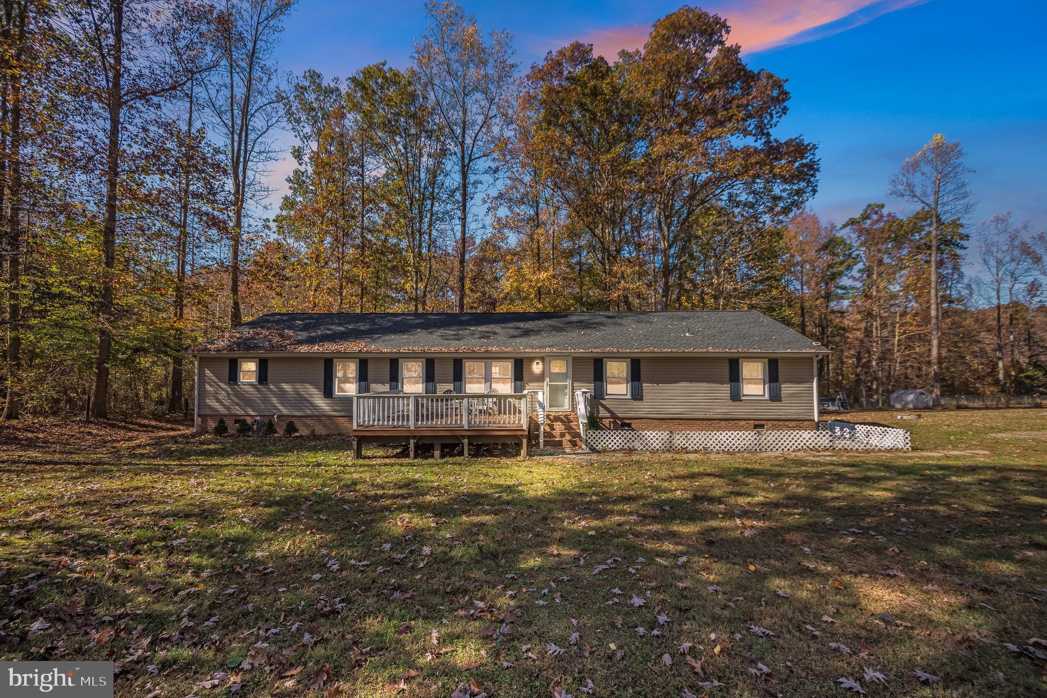 Welcome home to 5106 Greenbrach Street. This home is situated on just over 2.5 private acres and features four bedrooms, two full baths, and over 2000 sqft! The home is in pristine condition and has a ton of upgrades to include granite counters, LVP flooring, stainless steel appliances, updated cabinets and showers, tons of storage, front and rear deck, fenced in yard and so much more! Inside includes two large family rooms, open kitchen, and an additional  bonus room.  Outside has tons of open space for gardening, relaxing, and an above ground pool! If you are looking for privacy and a rural setting, this one is surely to have everything you are looking for and more! This one will not disappoint, schedule your showing today!