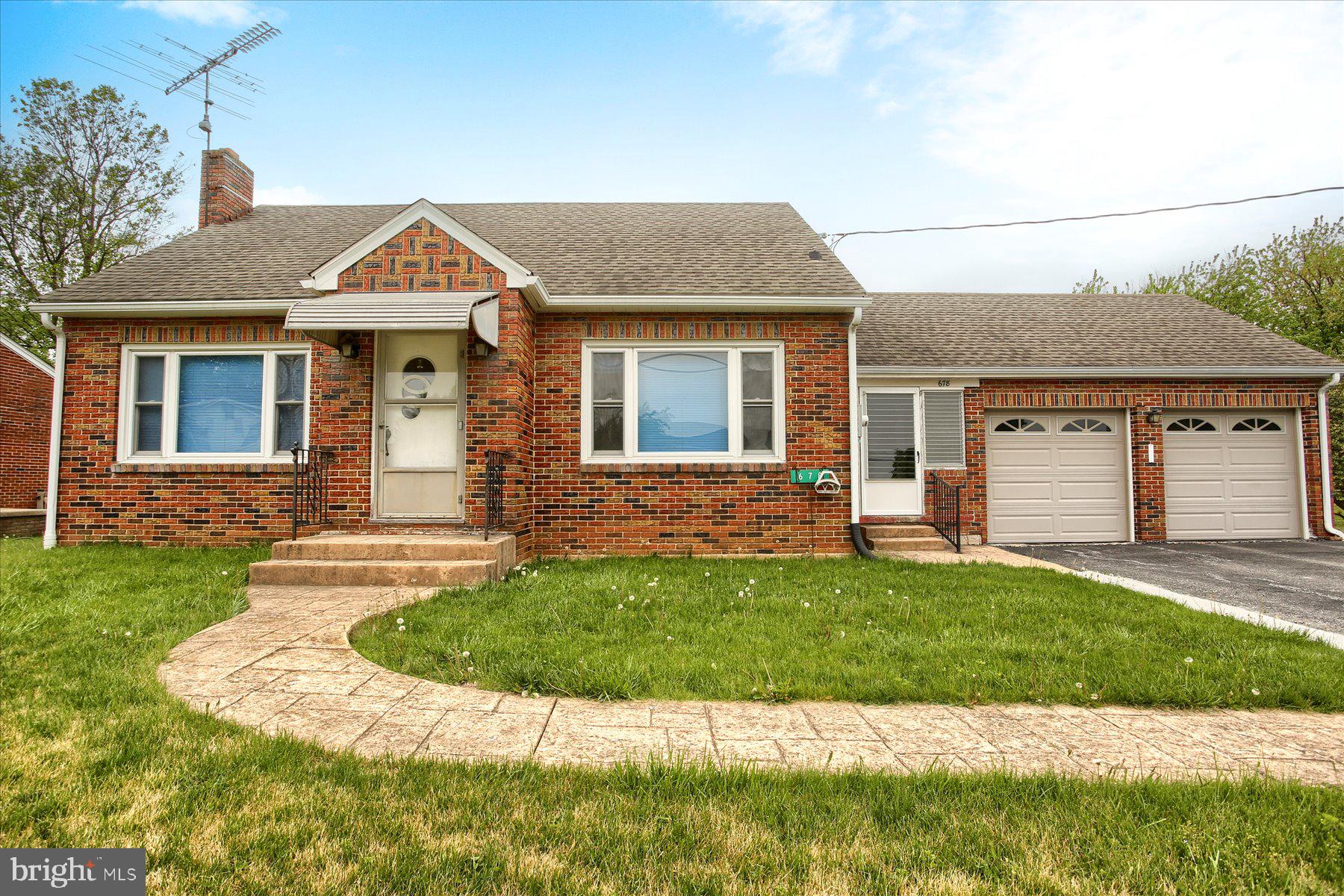 Price Reduced! This well-maintained brick rancher offers comfortable one-floor living in a peaceful country setting with scenic views of adjoining farm fields. Situated on a low-maintenance 0.25-acre lot, the home features 1,291 square feet with 3 bedrooms, 1.5 baths, and a functional layout designed for everyday convenience. The spacious kitchen includes all appliances, while the full basement provides excellent storage or future finishing potential. Additional highlights include an attached 2-car garage, natural gas hookup, stamped concrete walkways, and a paved driveway. Whether you’re looking to downsize or find an easy-to-maintain full-time residence, this property is ready for its next owner.