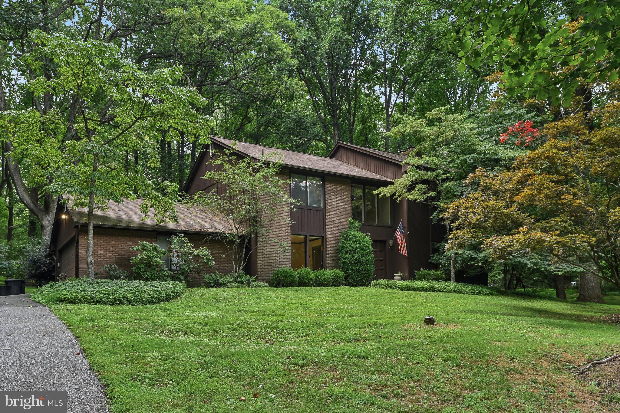 Discover the perfect blend of comfort, space, and privacy in this beautifully maintained 4-bedroom, 2.5-bath home in Owings Mills. Warm wood floors flow throughout the main living areas, while a cozy wood-burning fireplace creates an inviting gathering space. The spacious primary suite offers a peaceful retreat with a vaulted ceiling, skylights, and abundant natural light. The finished lower level provides added versatility with an office or bonus room, ideal for working from home, hobbies, or a fitness area. Outside, relax or entertain on the deck overlooking a backyard framed by mature trees, offering exceptional privacy and a serene setting. Conveniently located near shopping, dining, parks, and commuter routes, this home is ready to welcome its next owners.