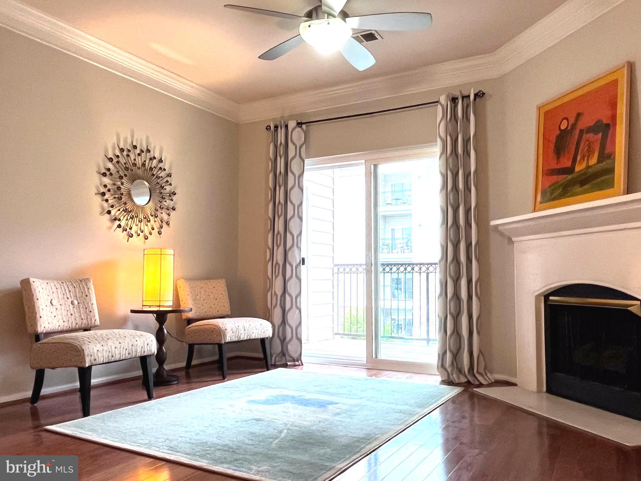 Welcome to this beautifully updated quiet 2-bedroom, 2-bath condo in the highly sought-after Gates of McLean community, ideally located in the heart of Tysons. This light-filled residence features 9-foot ceilings, crown molding, hardwood floors throughout, and an open-concept layout designed for both comfortable living and entertaining.
The spacious living room with a cozy gas fireplace flows seamlessly into the dining area, while the large patio door opens to a private balcony and fills the home with natural light. Functional and stylish window treatments convey with the property.
The upgraded kitchen features granite countertops and backsplashes, maple cabinetry, and stainless steel appliances. Both generously sized bedrooms offer walk-in closets with exceptional storage space. The renovated bathrooms showcase new vanity cabinets with quartz countertops, adding a fresh and modern touch.
Recent updates include a new 36" counter-depth refrigerator (2025), new dryer (2025), and hot water heater replacement (2022).
Enjoy the convenience of multiple parking options, including one reserved garage parking space (#261) conveniently located next to the elevator, one assigned outdoor parking space (#486), plus two guest parking passes.
Residents of Gates of McLean enjoy gated access and exceptional community amenities including a fitness center, outdoor pool, clubhouse, movie theater, and beautifully maintained grounds.
Unbeatable location just moments from the McLean Metro Station, Capital One Center, Wegmans, restaurants, shopping, and major commuter routes including I-495, I-66, and Route 267. This home offers the perfect combination of comfort, convenience, and modern living in one of Northern Virginia’s most desirable locations.
