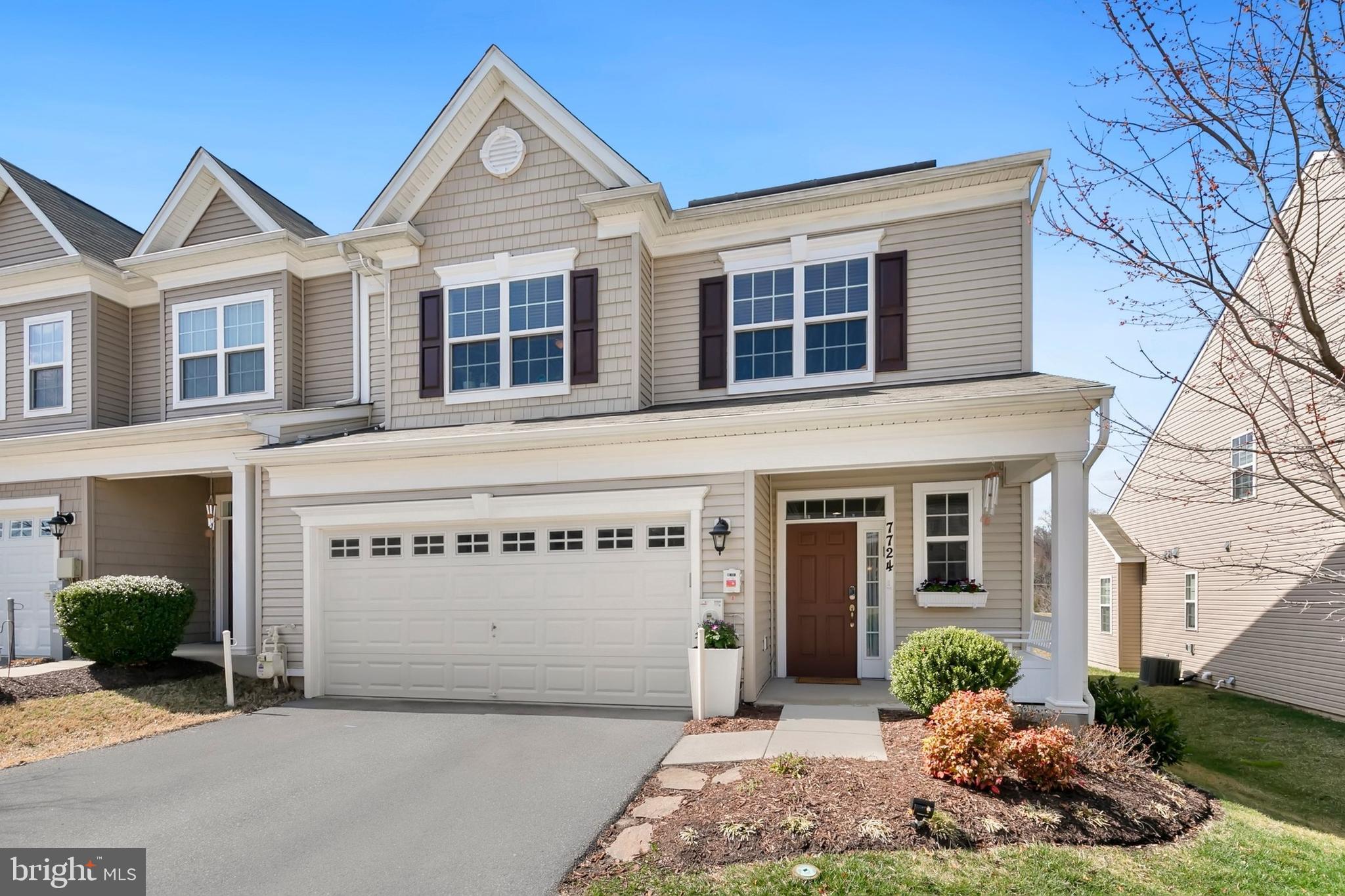 Welcome to this beautiful end-unit townhouse that is perfect for multigenerational living with bedrooms and baths on all 3 floors. This home is one of twenty-four 55+ homes that are located within the larger (all ages) Simpson Mill neighborhood.  Only one resident needs to be 55+, and additional residents must be over 18 years old. The main floor has an open-concept living room with a gas fireplace, dining room and kitchen plus a powder room. Hardwood floors and lots of light make this feel like a single family home. In addition, the main-floor primary bedroom, full bath, and walk-in closet make single-level living possible. The back deck includes an automatic sunshade and sunset views. The second floor has new carpeting, a loft-sitting area, two spacious bedrooms, a full bath and a laundry room with full-size washer/dryer. The finished lower level has tall ceilings, new carpet, a fourth bedroom, full bath, wet bar and plenty of room for relaxing or entertaining. This home has many thoughtful details including: Bump out and windows in dining area, keyless home entry, extra laundry hook-up on main floor, kitchen drawers instead of fixed shelving, large ceiling fans, custom blinds, and lots of cabinets for storage in the 2-car garage.  You will also enjoy low energy costs thanks to the solar panels - which are owned, not leased. The HOA offers a club house and concierge-level service with lawn care, and snow plowing of sidewalks and driveway! If you were to build this home new, with all the upgrades, it would cost well over $800k and take months for delivery. Get ready to see it soon because it will not last!