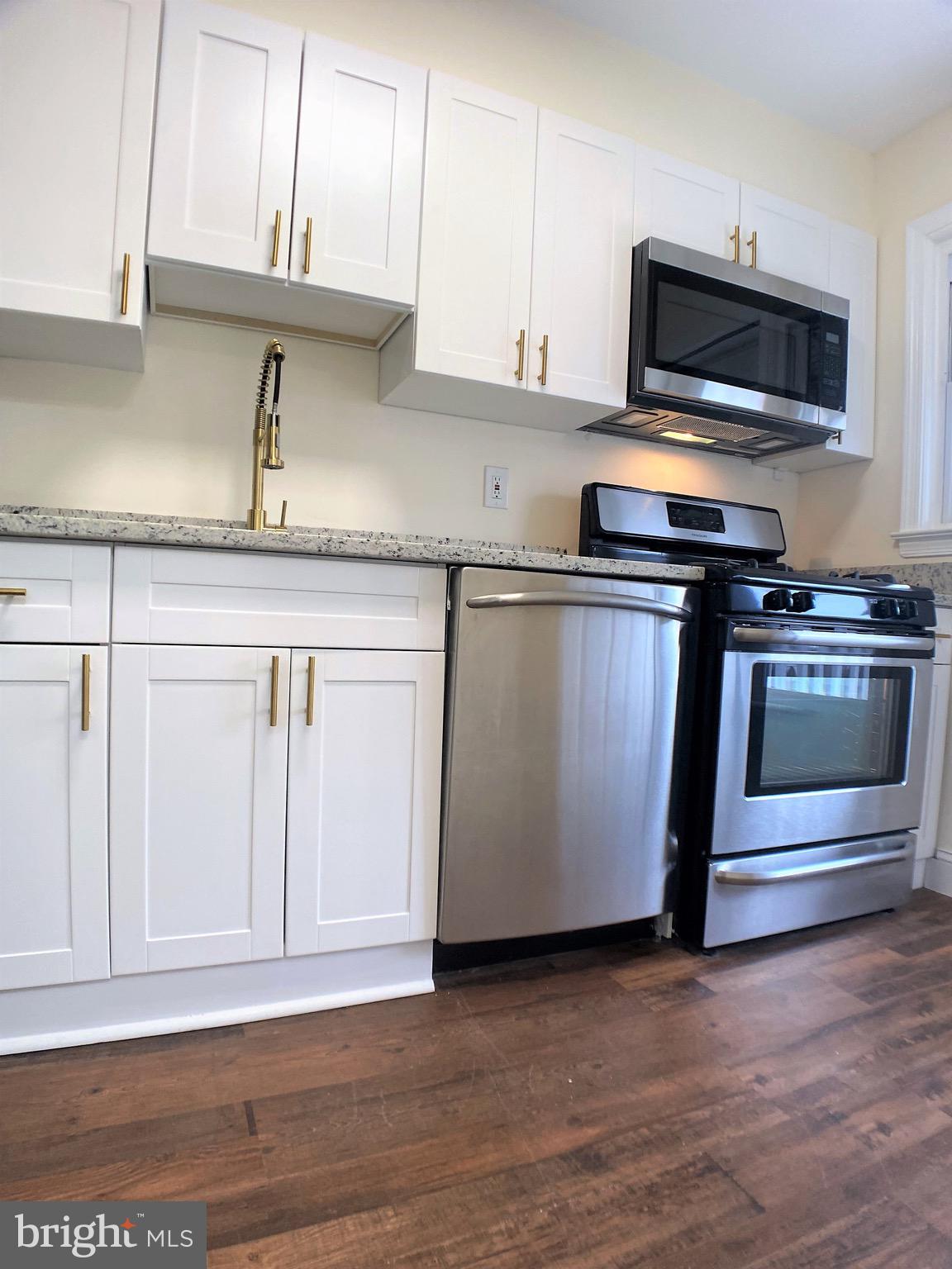 BACK ON THE MARKET!! This beautifully rehabbed 3 bedroom,  2 bathroom is waiting for you!! Features updated stainless steel appliances with great cabinet space and beautiful flooring through out. Includes a full size washer/dryer in the fully finished basement! Convenient Essex location near major highways, schools and shopping. Make your appointment today! Parking available in the back