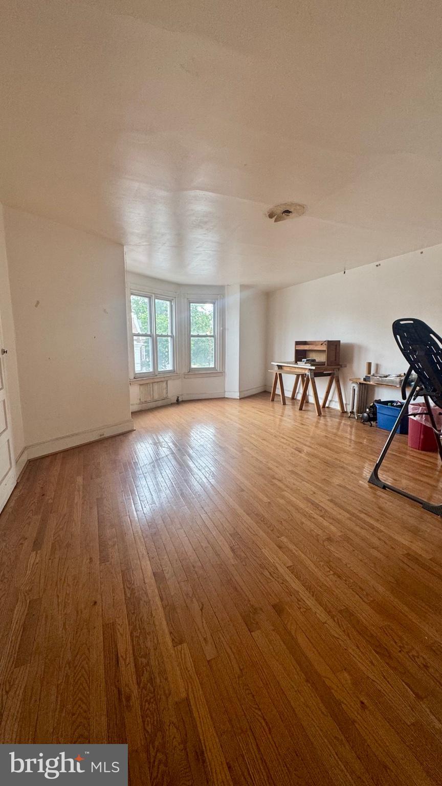 Calling all investors! Exceptional opportunity to own a CMX-2 mixed-use triplex rehab property with strong income-producing potential in a prime, high-visibility location. This property features a ground-level commercial storefront with high ceilings and access to a full basement, offering endless possibilities for retail, office, or business use. The second-floor residential unit offers 2 bedrooms and 1 full bath, complete with high ceilings, a spacious kitchen, vinyl flooring, generous closet space, and abundant natural light throughout. The third-floor unit also features 2 bedrooms and 1 full bath, highlighted by hardwood floors, spacious rooms, and bright sun-filled living spaces. Property is in need of full renovation, making it an ideal value-add opportunity for investors or owner-operators looking to maximize cash flow and build equity. Conveniently located near SEPTA bus routes, regional rail, the Broad Street Line, Einstein Hospital, La Salle University, and Center City. A fantastic opportunity in a vibrant and rapidly developing area!