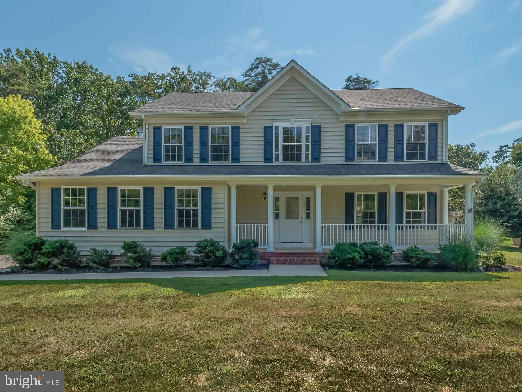 4 Bed, 3 bath, Over 3400 Finished sq. ft.  2 car side load garage,   1/2 Acre. , FP, front porch, rear deck,  2 Car Garage, Stunning kitchen w/ White Cabinets, Stainless Kenmore elite appliances, Quartz counters, Large island, hw Floors, FP. Master Suite is stunning...  Shower w/ dual shower heads, quartz counters & shower bench... too many upgrades to list. Walk to private beach