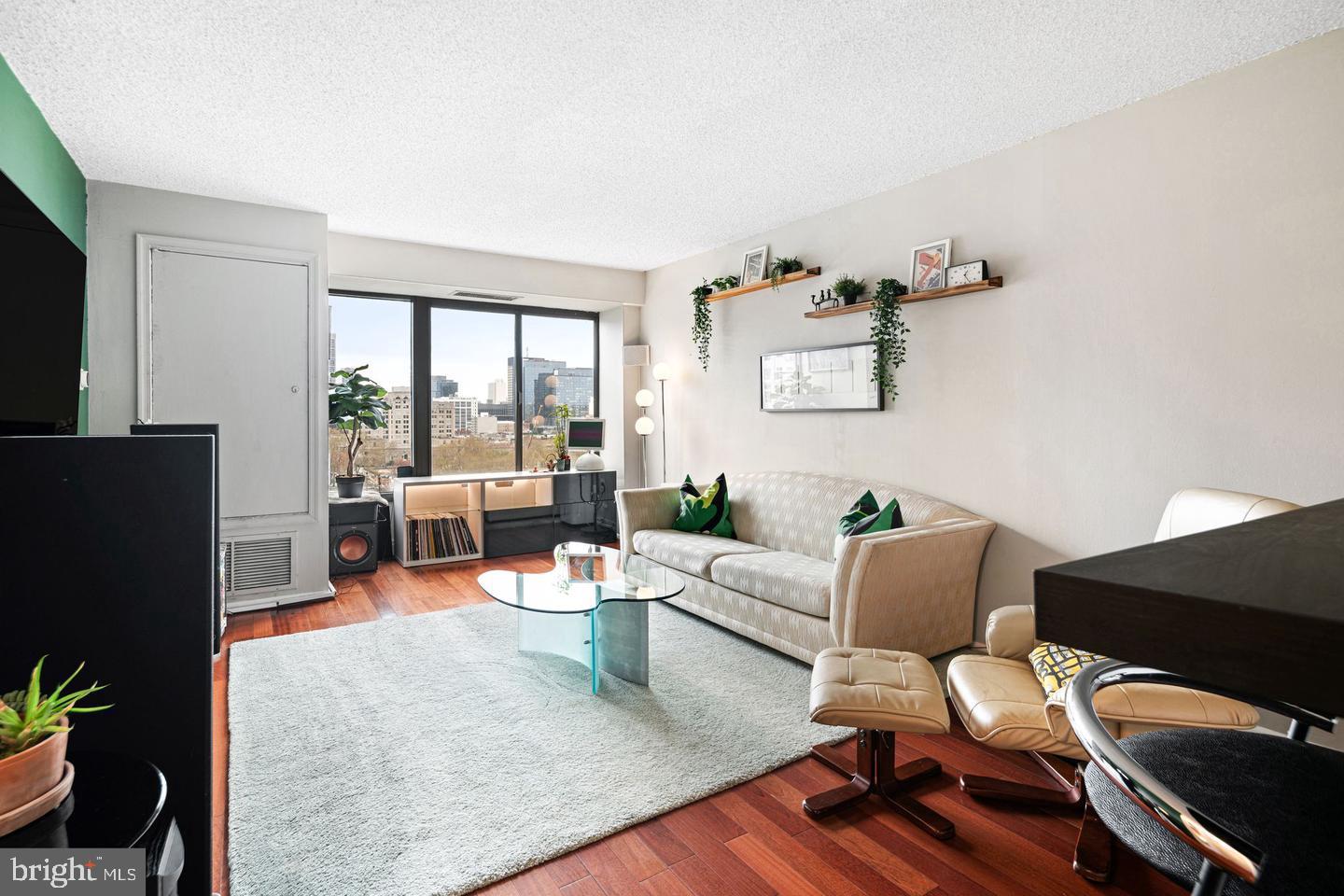 Welcome to Unit 922 at Cityview Condominiums, a bright and beautifully maintained one-bedroom, one-bath residence featuring a highly sought-after south-facing exposure, breathtaking Philadelphia skyline views, and an assigned parking space.
Located on the ninth floor, this sun-filled home is flooded with natural light through floor-to-ceiling windows that showcase spectacular city views. The open-concept floor plan is perfect for everyday living and entertaining. The updated kitchen features rich espresso cabinetry, stainless steel appliances, ample counter space, and a breakfast bar, while the spacious bedroom offers generous closet space. The updated bathroom boasts clean, contemporary finishes.

An assigned parking space is included—a valuable convenience in the heart of the city.

Cityview offers exceptional amenities, including a heated outdoor pool, fitness center, library, beautifully landscaped gardens, guest suites, 24-hour concierge, and on-site management. 
Cityview is an excellent opportunity for someone looking to purchase a home for a student attending Penn, Drexel, Temple, or one of Philadelphia's many universities, building equity instead of paying rent! 

Perfectly situated in Philadelphia's vibrant Art Museum neighborhood, you're just steps from Whole Foods, Target, the Barnes Foundation, the Philadelphia Museum of Art, Kelly Drive, and some of the city's best restaurants and cafés. With easy access to Center City, public transportation, and major highways, this location truly offers the best of city living.

Whether you're purchasing your first home, downsizing, or searching for the perfect city retreat, Unit 922 offers an exceptional combination of location, amenities, natural light, and convenience. Come experience the Cityview lifestyle!