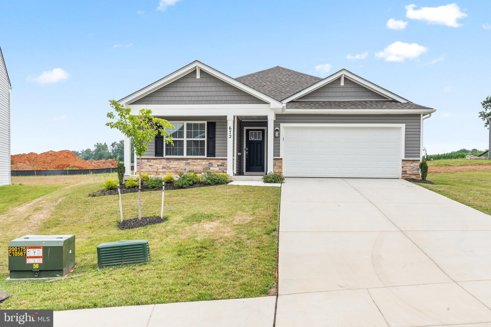 Welcome Home to 672 Armstrong Avenue! This 4-bedroom, 2 bath home in Virginia Commons is the FIRST Re-sale of the single-level home style! Available for immediate occupancy! This is also the lowest-priced home EVER sold in this community! As mentioned prior, the home is entirely on one floor with wide door entries, perfect for those looking to eliminate stairs! Notable features include a beautiful concrete driveway, 2 car garage, full suite of barely used stainless-steel kitchen appliances, and more! The Furnace system is powered by efficient natural gas, lowering overall utility costs. The stovetop is also natural gas fueled. This one won't last long! Call today to schedule your private tour!
