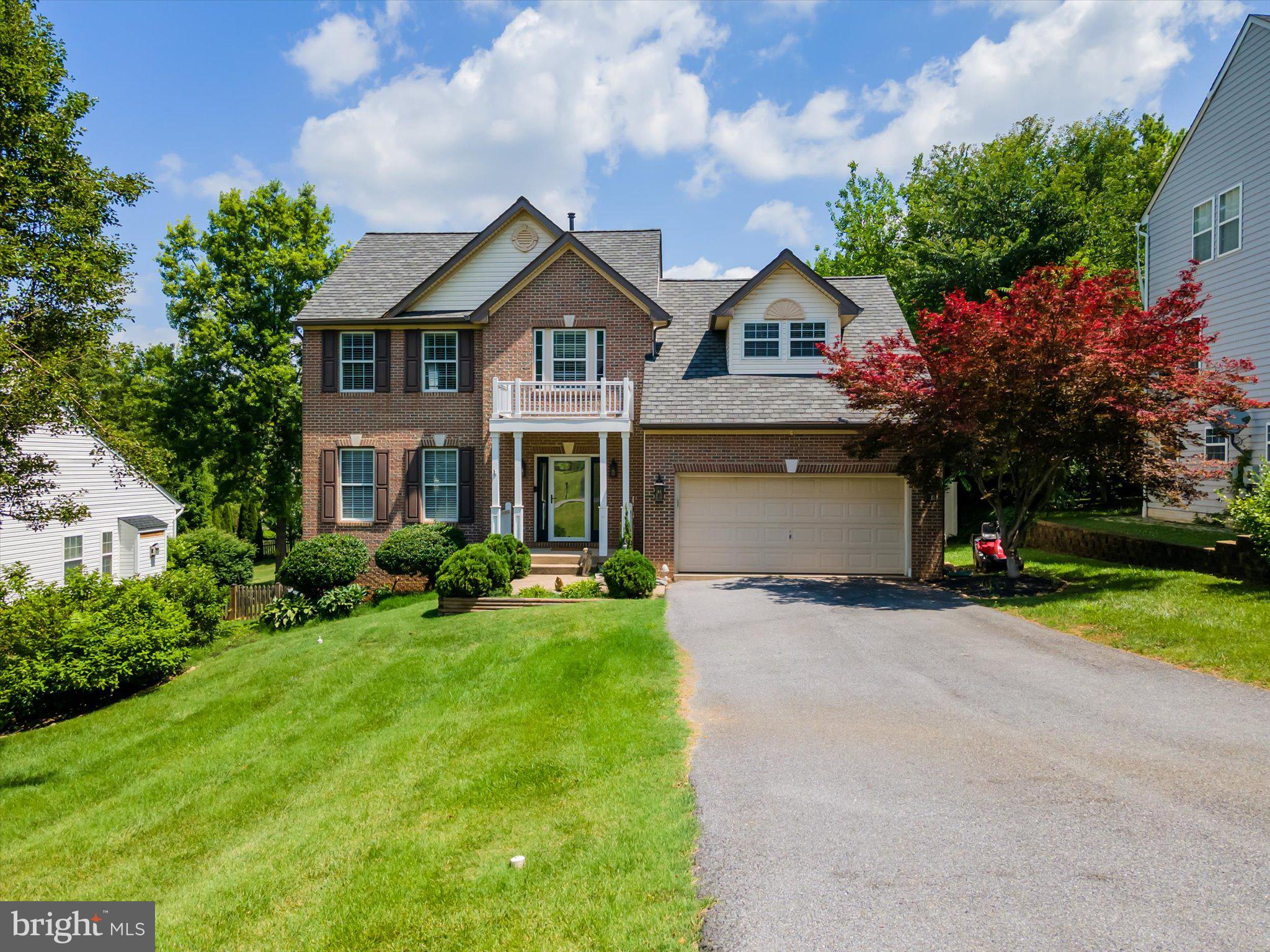 Welcome to the house that throws better parties than you do! This former model home combines an easy-flow layout with standout indoor and outdoor entertaining spaces, all just one block from War Memorial Park in the City of Martinsburg.  Step inside to an open floor plan that makes hosting effortless, with hardwood flooring throughout and upgraded moldings that add a polished, custom feel to every room. Four spacious bedrooms and 2.5 baths provide plenty of room for family, guests, or a home office setup. The laundry room is conveniently located on the upper level and includes a Speed Queen washer and dryer that convey, offering dependable, high-performance laundry right where you need it. Situated just one block from War Memorial Park, you’re an easy stroll away from playgrounds, walking paths, community events, and one of Martinsburg’s most beloved in-town green spaces. The city location offers quick access to local shops, dining, schools, and commuter routes, making everyday errands and commuting simple while still enjoying a neighborhood feel. Step out back to a multi-level Trex deck designed for entertaining, featuring a full bar area wired for speakers so you can host everything from casual cookouts to game-day gatherings. The fenced backyard includes an above-ground pool and is already wired for a 12-person hot tub, giving you a ready-made retreat for summer fun and year-round relaxation. The privacy fence helps create a secluded oasis where you can enjoy your outdoor space without sacrificing comfort or convenience.  Major mechanical updates have already been taken care of, including a new HVAC system installed in 2022 featuring a Goodman 1 Fit smart system with an intact warranty for peace of mind. The home also boasts a new lifetime roof with warranty, plus a new hot water heater and water softener, reducing future maintenance concerns and adding long-term value. Hardwood floors were refinished in 2022, so the interior is move-in ready with a fresh, updated look from day one.