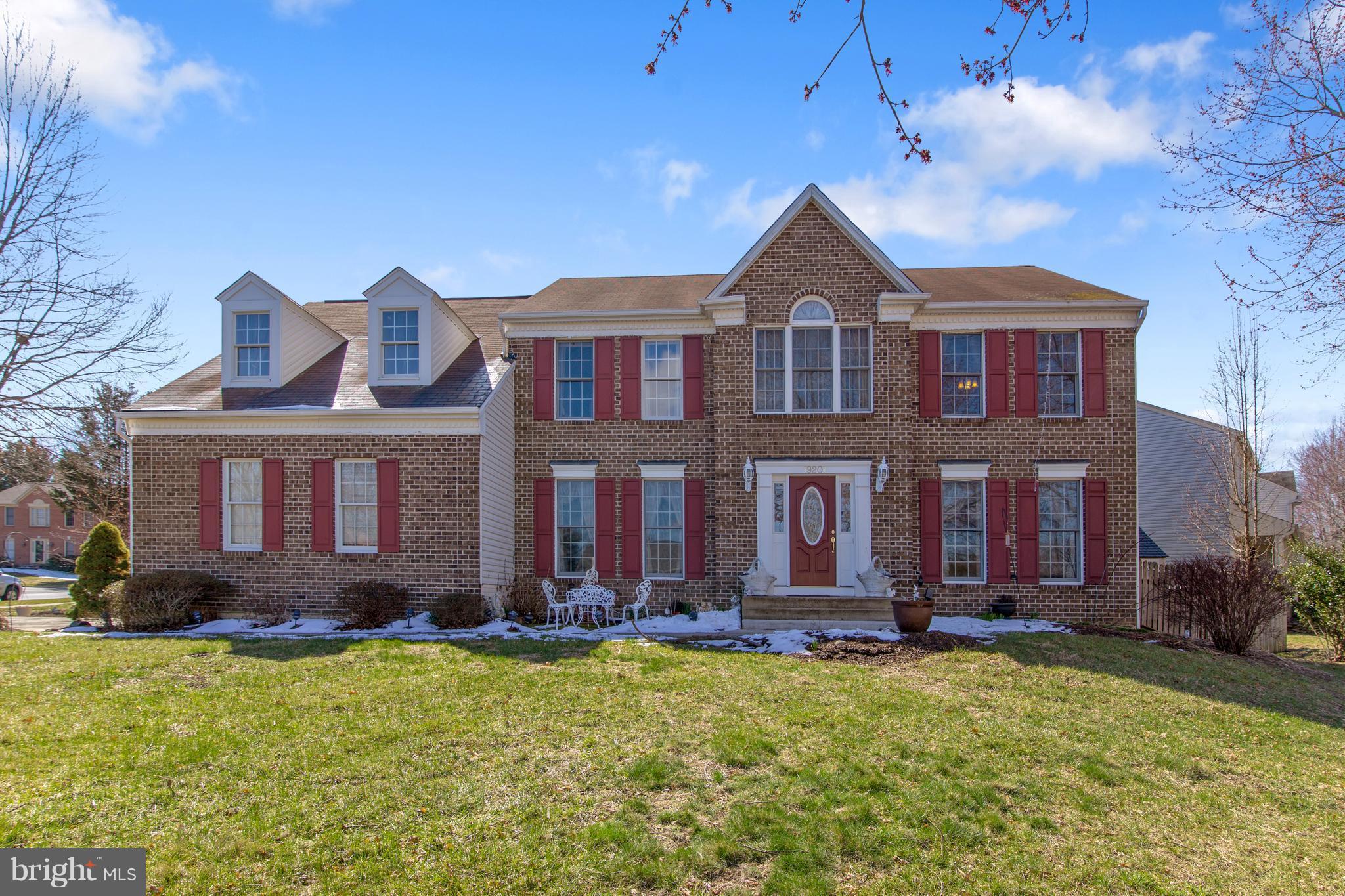 Gorgeous brick front upgraded colonial corner lot! 2 story foyer, over-sized dining rm, NEW gourmet kitchen w/granite counter, SS appl. Sunken family rm with vaulted ceilings, skylights, custom built fireplace, walk out to beautiful patio. Den could be a 5th rm. Master bed rm w/luxury bath. Finished lower level, media room, wet bar, cook top, refrigerator, recreation rm, exercise room &more.