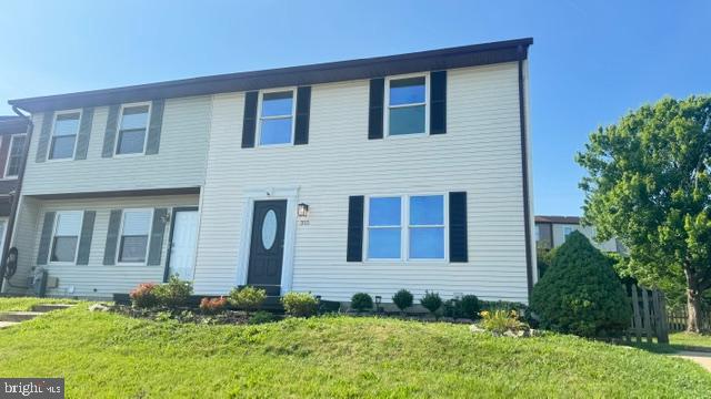 Not your ordinary End Unit Townhome-  This place has a unique floor plan with a den/office on the mail level.    Updated bath and kitchen.  Versitile flooplan- Newly painted with new carpet and fixtures.  Slider to deck and oversized fenced rear yard.  Driveway for private off street parking  - Partically finished basement ready for your personal touches.  All applainces convey.  Nothing to do but move in and make it yours.