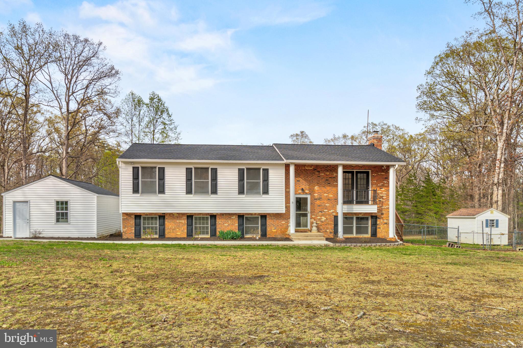 Welcome to 12239 Elk Run Church Rd—a peaceful 5-acre retreat in the heart of Midland, VA. This well-maintained 4-bedroom, 3-bath brick home combines privacy, functionality, and recent upgrades.

This home features an open, updated, and spacious kitchen, along with upgraded flooring throughout and scenic views of the property from two large decks. Major improvements include a new roof, new water heater, new well, new water line, new sliding glass doors, newer HVAC, and a fully renovated septic system. Additional updates span nearly every corner of the home—from the kitchen, bathrooms, and lighting to the flooring and appliances—even the washer and dryer are brand new. A new water filtration and softening system and new chimney cap add to the list of thoughtful enhancements.

Outside, the land is ready for your lifestyle. A private pond adds natural charm, while the dedicated horse barn offers space for animals, equipment, or creative projects. The detached garage provides secure parking, storage, or workshop potential.

Whether you’re seeking a quiet homestead, a hobby farm, or simply more room to live and breathe, this property offers unmatched potential with the heavy lifting already done. Schedule a showing today!
