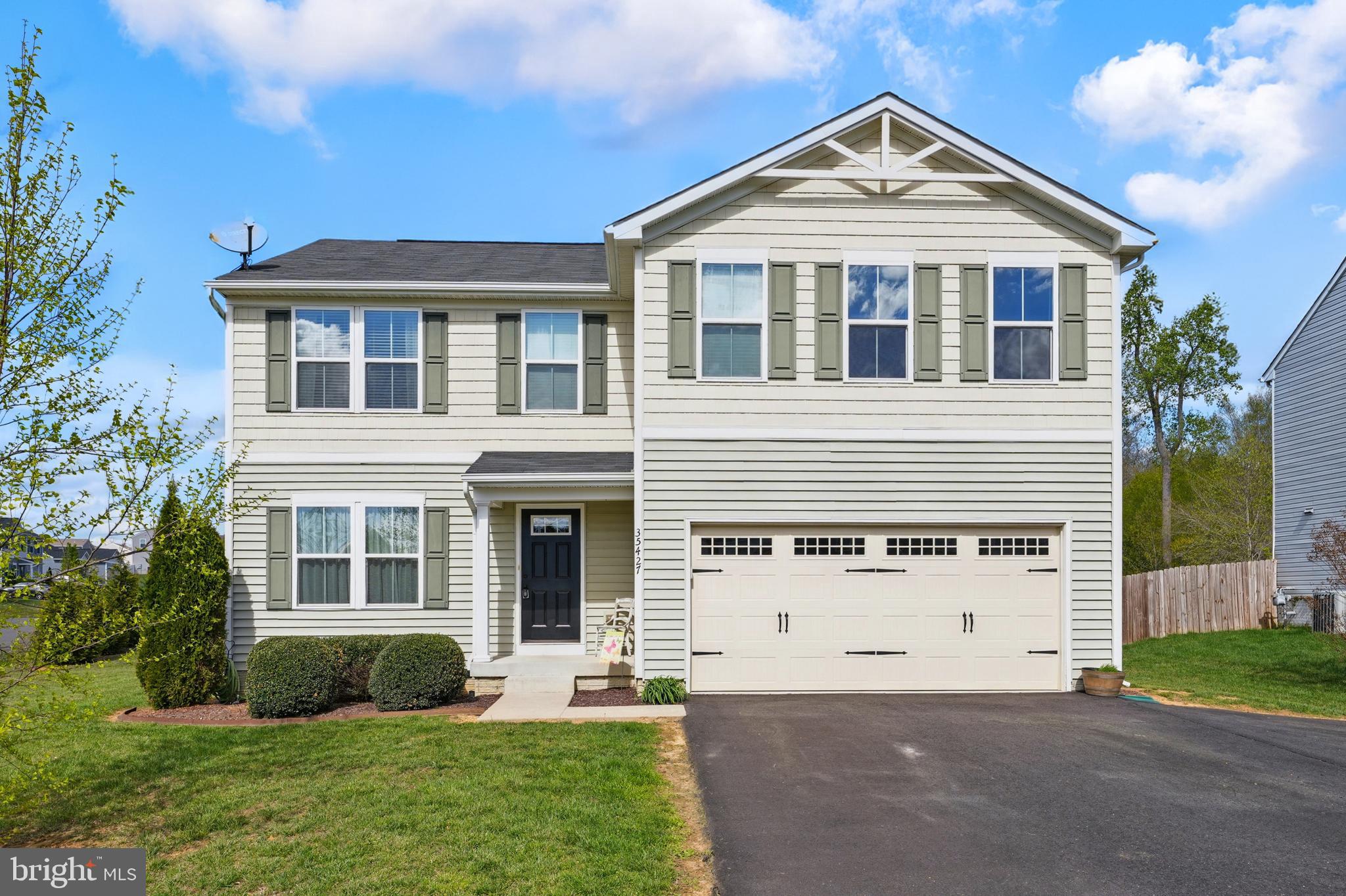 Beautiful 5 bedroom home ready for your new family.  Corner lot providing the yard space to play or simply relax.  The rear yard is enclosed by the border landscaping to offer the scenic screening that invites a perfect spot to relax or entertain family and friends.  The rear covered deck is an exceptional addition.  The interior main level has an open inviting plan.  The large family room/great room is open to the dining area and large kitchen.  The upper level has a total of 5 bedrooms and Laundry room.  All rooms with nice closet space and beautiful craftsman windows .  The Primary ensuite with extra space and expansive walk in closet.  This house is move in ready!   Home backs to trees and the  Scenic trail very short walk from the door.   Professional photos to come!
