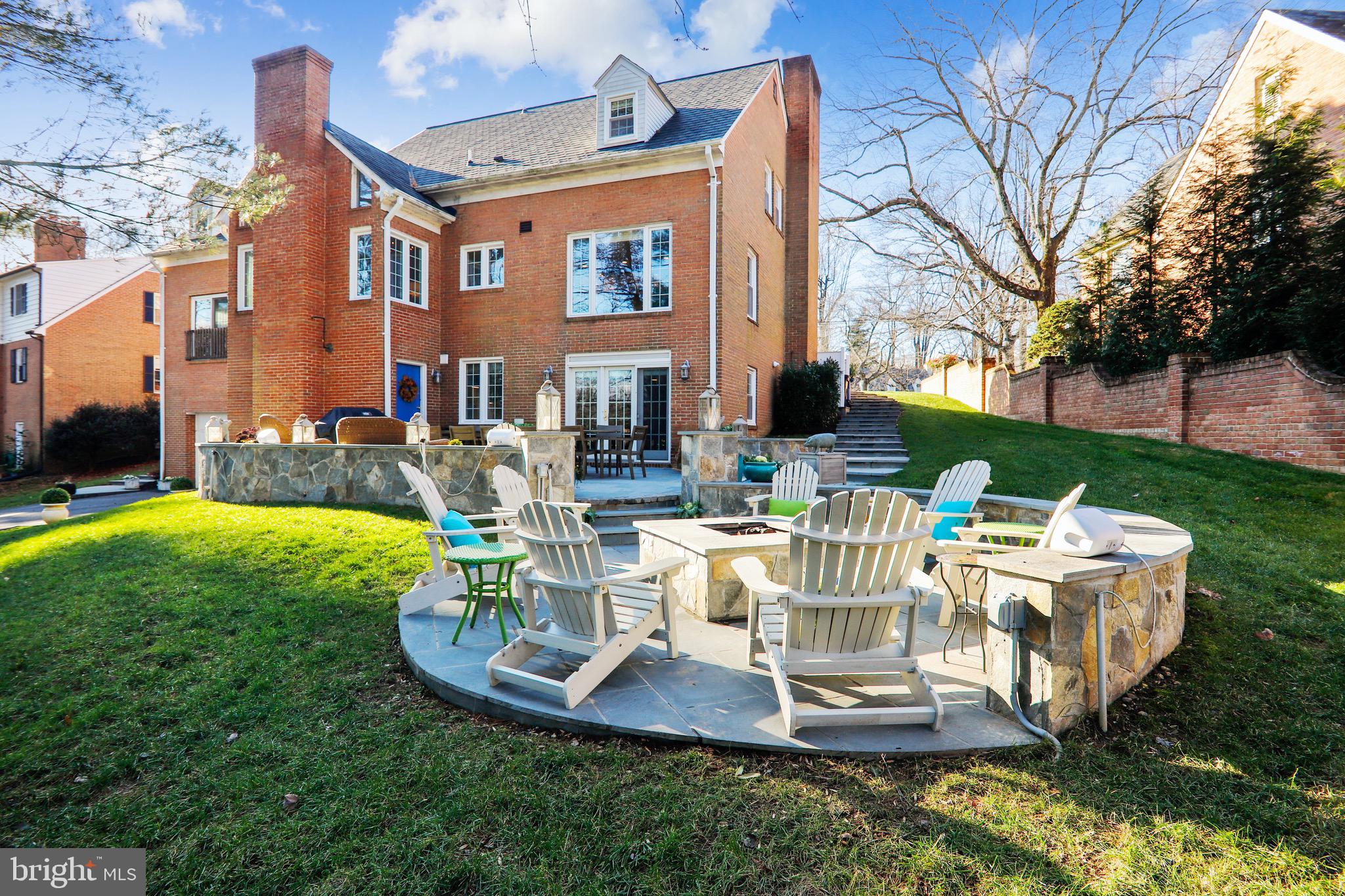 OPEN HOUSE ON 1/3/21 IS CANCELLED- HOME IS UNDER CONTRACT!  Located on a quiet cul-de-sac in the Hamlet, this elegant Chevy Chase home offers three light-drenched levels of living space with an open floor plan featuring 5 bedrooms, 5 1/2 baths, gorgeous updates and renovations, grand-scale rooms, hardwood floors, new Thompson Creek windows throughout, and CertainTeed Grand Manor composite roof (warrantied for life), on one of the largest lots in the neighborhood!   The spacious foyer (with ample room for a grand piano) welcomes you and leads to the dining room with gas fireplace that comfortably seats 12+, and gracious living room with a soaring vaulted ceiling, and second gas fireplace with a dramatic floor-to-ceiling stone hearth. The gourmet kitchen is a chef's delight with gas cooktop, double ovens, gleaming granite counter tops, crystal mini-chandeliers, cabinet space galore, and plenty of room for family and friends to gather around the large quartz-topped island.   When formal dining is not on the plate, enjoy a tradition of lively family dinners in off-kitchen dining space that easily seats 10+, and offers great natural light and expansive views of the beautifully landscaped rear yard through floor to ceiling windows. The main level continues to the powder room and two bedrooms (including a main-floor master), each with ensuite bathrooms. Beautifully updated bathrooms throughout the home feature marble countertops, tile floors, rimless glass shower doors and attractive wall-mounted towel racks.   The upper level boasts a relaxing owners suite retreat with lovely dormers, reading nook, custom-made California closets, ensuite bath with dual sinks, and free-standing tub/shower. Down the hallway you will find two more generously sized bedrooms and the newly renovated hall bathroom. The extraordinary lower level has it all, including amazing family/entertainment space, newly renovated full bath, second fully equipped kitchen with new stainless-steel appliances and dining area flooded with natural light through French doors leading out to the over-sized stone patio and fire pit. The lower level includes a gorgeous laundry room with custom cabinets and mini-chandeliers, mud room with custom shelving and plenty of storage space, and an additional outside rear entrance.   The over-sized rear-loading garage has a super-high ceiling that could easily accommodate a car lift and multiple vehicles. The expansive garage space features a large built-in work bench, upper deck storage, and a separate storage room that could easily be converted for use as a dark room for photography buffs. The home's exterior green space and elegant stone hardscaping provide magnificent outdoor living. Attractive landscaping, a circular front driveway and stone walkways lead down to the magnificent rear slate stone patio and step-down firepit area. The rear yard is well-established and meticulously maintained, providing relaxing green space after a long day of work downtown or at home. The long and winding rear driveway,  framed by mature trees, leads up to the rear-loading garage and easily accommodates 10+ vehicles. Simply put, this is THE ONE at this price in Chevy Chase.   PLEASE CLICK ON THE VIRTUAL TOUR LINK FOR ROOM BY ROOM PHOTOS AND FLOOR PLAN, AND BOOK YOUR PERSONAL TOUR TODAY!