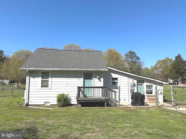 Very rare to find an adorable little cottage located on approximately 2 acres. Newer roof, windows & doors. This one has 2 beds, 1 bath, a bright open sunroom thats perfect for a family / living room, a cute little kitchen & dining room.  Full size stackable washer/dryer.  Newer two zone ductless mini-split.  This beauty sits on almost two acres of flat & open land backing to woods.  There is a nice new shed as well as part of the rear yard being fenced in.  It's one of the largest / flattest lots in Shady Side, so don't miss seeing this amazing location.  The home has been well cared for, but being sold AS-IS.  No covenants or restrictions, plenty of parking for your boat or RV.   Walk to Shady Side Elementary school, restaurant, grocery store & local marina. Home was just hooked to public sewer. 50 minutes to D.C, 30 minutes to Annapolis. Why pay rent when you can own for less or if you are looking for that perfect lot in a quiet community close to the water to turn into your dream home oasis...  You've found it.  This one will not last long, so make sure to see it as soon as you can.