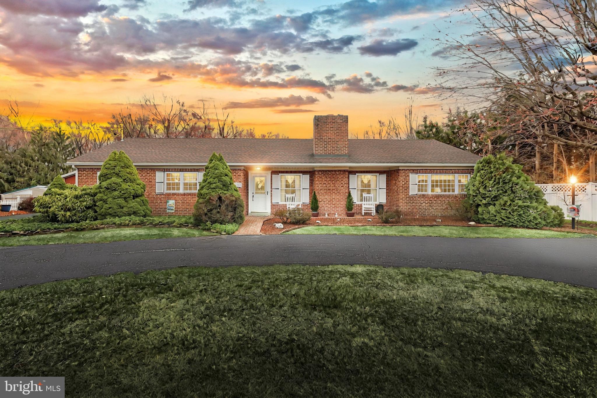 This home has everything…a large sunroom, huge deck, an in-ground pool and a lot that backs up to woods.  You never have to leave this almost 1900 square foot ranch home with 3-bedrooms, large living room with a fireplace and a family room that leads to the sunroom.  Currently the bedroom side of the home is carpeted, but has hardwood flooring under all of the carpet.  A first-floor laundry is a great addition and is convenient to the rest of the house. There is a cathedral ceiling in the family room with a staircase leading to the attic which has ample storage and has potential for even more. Bring your ideas to finish the basement just the way you want to.  The basement has two rooms, one 21’ x 23’, with a bar and bathroom that has a shower and sink. You just need to finish the floor. The other room is 25’ x 26’ and is currently used for storage. The 2-car detached garage is oversized and has ample storage in the front.  The horseshoe driveway makes exiting and entering so accessible.  This home is located near the high school and not far from Hanover and Gettysburg.