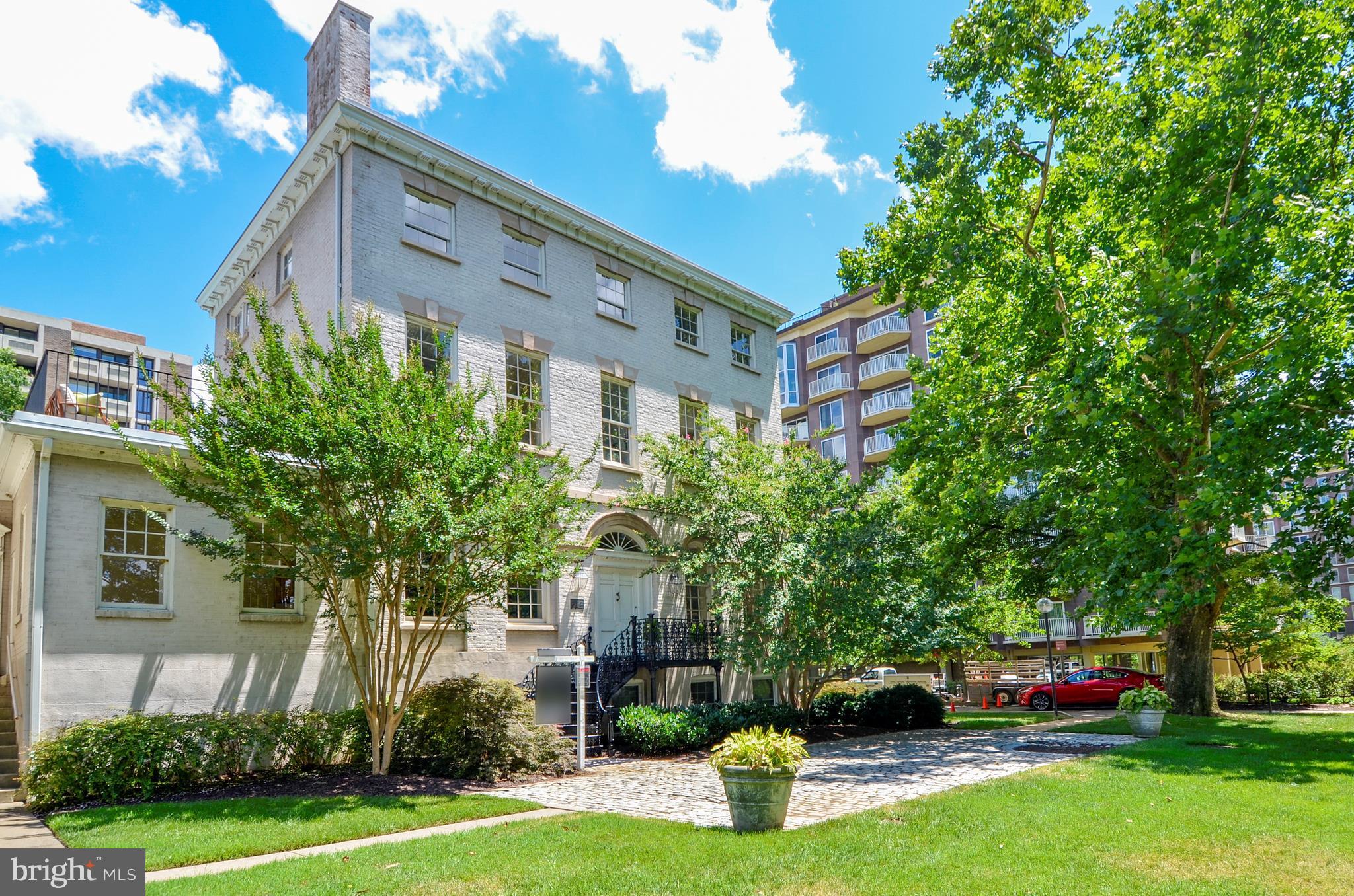 Spectacular and Unique! The Historic Thomas Law House fronts the new waterfront. Sited just beyond the majestic tree line overlooking a brand new park, Washington Channel of the Potomac River and the Wharf Phase II. It features a sprawling lawn flowing to its borders. It boasts 3 floors and more than 4000 square feet of living space with a lower level apartment. Truly a rare opportunity!