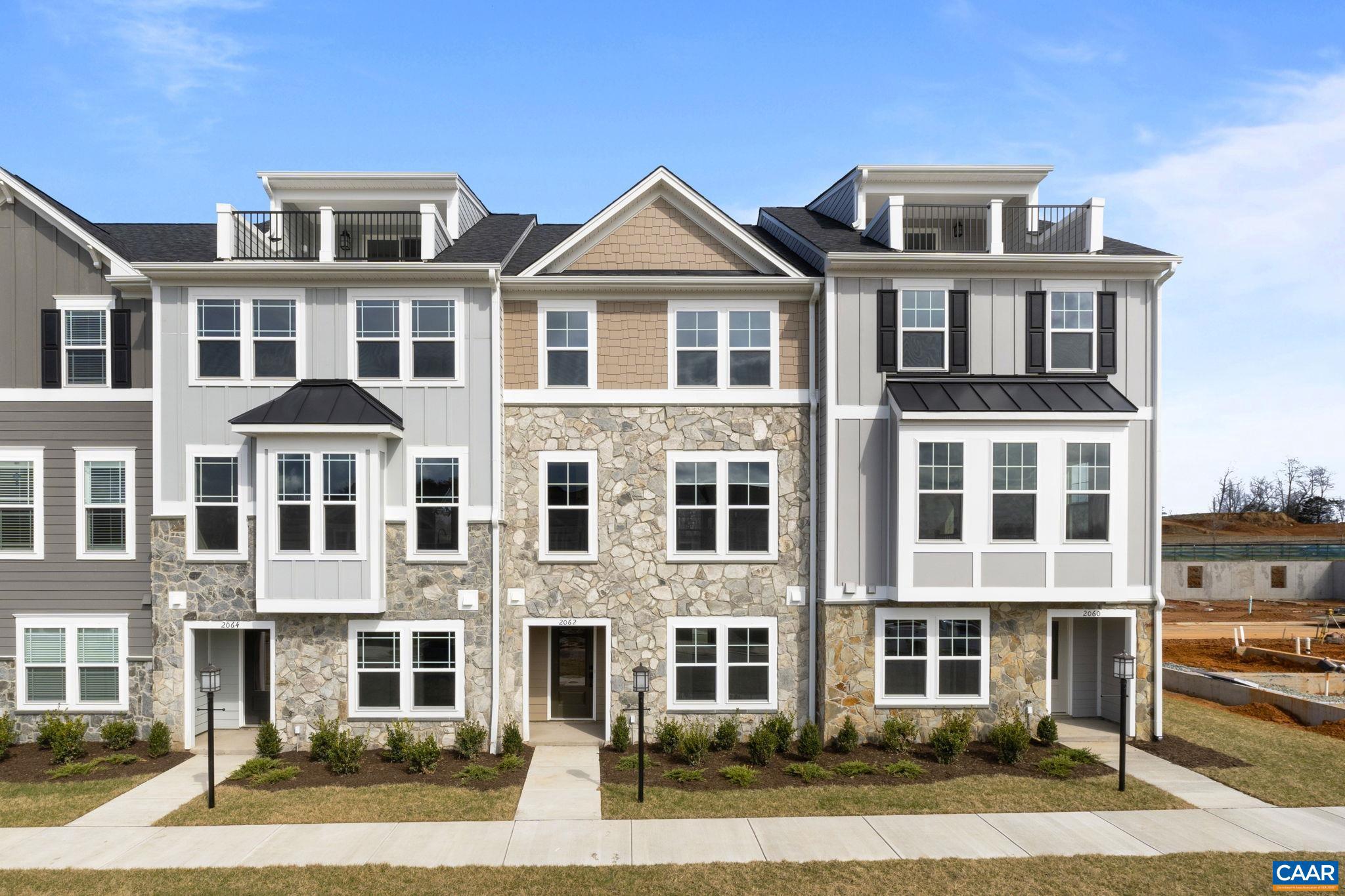 Under construction for an early August '26 completion! This Poplar II townhome in Glenbrook offers a comfortable, farmhouse-style layout surrounded by mountain views, green spaces, and walking trails?all within easy reach of downtown Crozet. This interior unit features a bright kitchen with dark green cabinetry and a walk-in pantry, a spacious rear deck off the main level, and a first-floor study with half bathroom - perfect for a home office or den. You'll find thoughtful touches throughout, like oak stairs, solid core interior doors, wood shelving, and an energy-efficient furnace. A two-car garage is included for added convenience. Community perks include a fire pit, playground, nearby path to Crozet Park and access to downtown. Photos are of a similar home and may show optional or upgraded features; virtual staging is provided for inspirational purposes only.,Granite Counter,Maple Cabinets,Painted Cabinets,White Cabinets