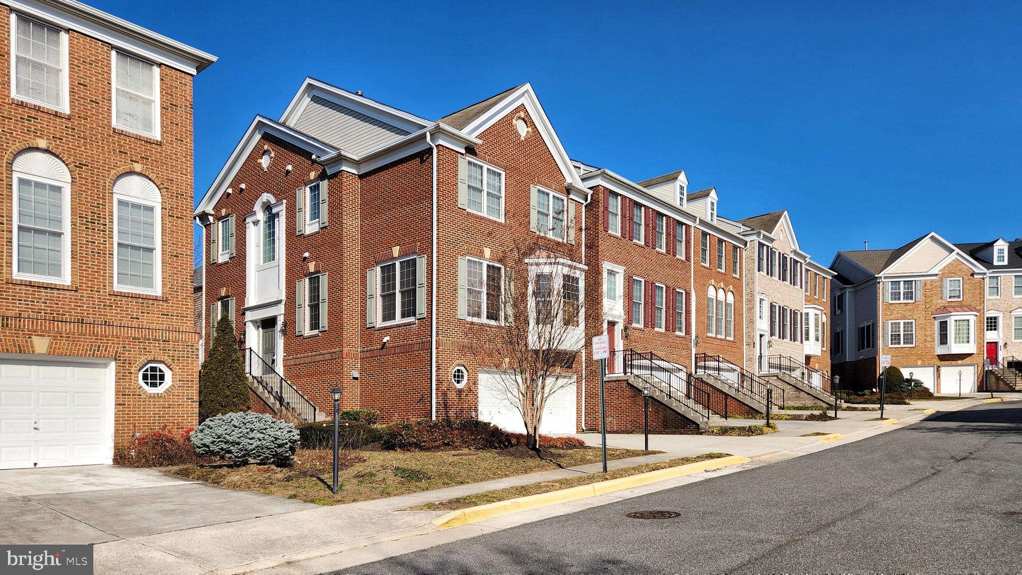 ** Tremendous End Unit Townhouse!  Oversized 2 Car Garage with a Window and Spacious Driveway. ** 4 Bedrooms & 3 Full Baths and 1 Half Bath. ** Hardwood Floors throughout! ** 3 Level Bump Out.  ** Upgraded Kitchen with Granite Counter-Tops, SS Appliances. ** Dining Room with Crown Molding and Chair Rail. **  Main Floor has one Office Room and an Extra Sunroom leading to large TREX Deck. ** Luxury Primary Bath with double sink, separate shower booth and Jacuzzi Tub.  ** Large Laundry Room in Bedroom Level.  ** Spacious Primary Bedroom has a Tray Ceiling with a Ceiling Fan. ** Groun Level Basement has Recreation Room, one Exerecise Room and one Guest Bedroom and a Full Bath with Tub. **Bay Window. **Largest Model in the Community!  **  Fully Fenced Back Yard!  ** Lots of Visitor Parking Lots. ** You will Love it! ** Please use the Shoe Covers provided.