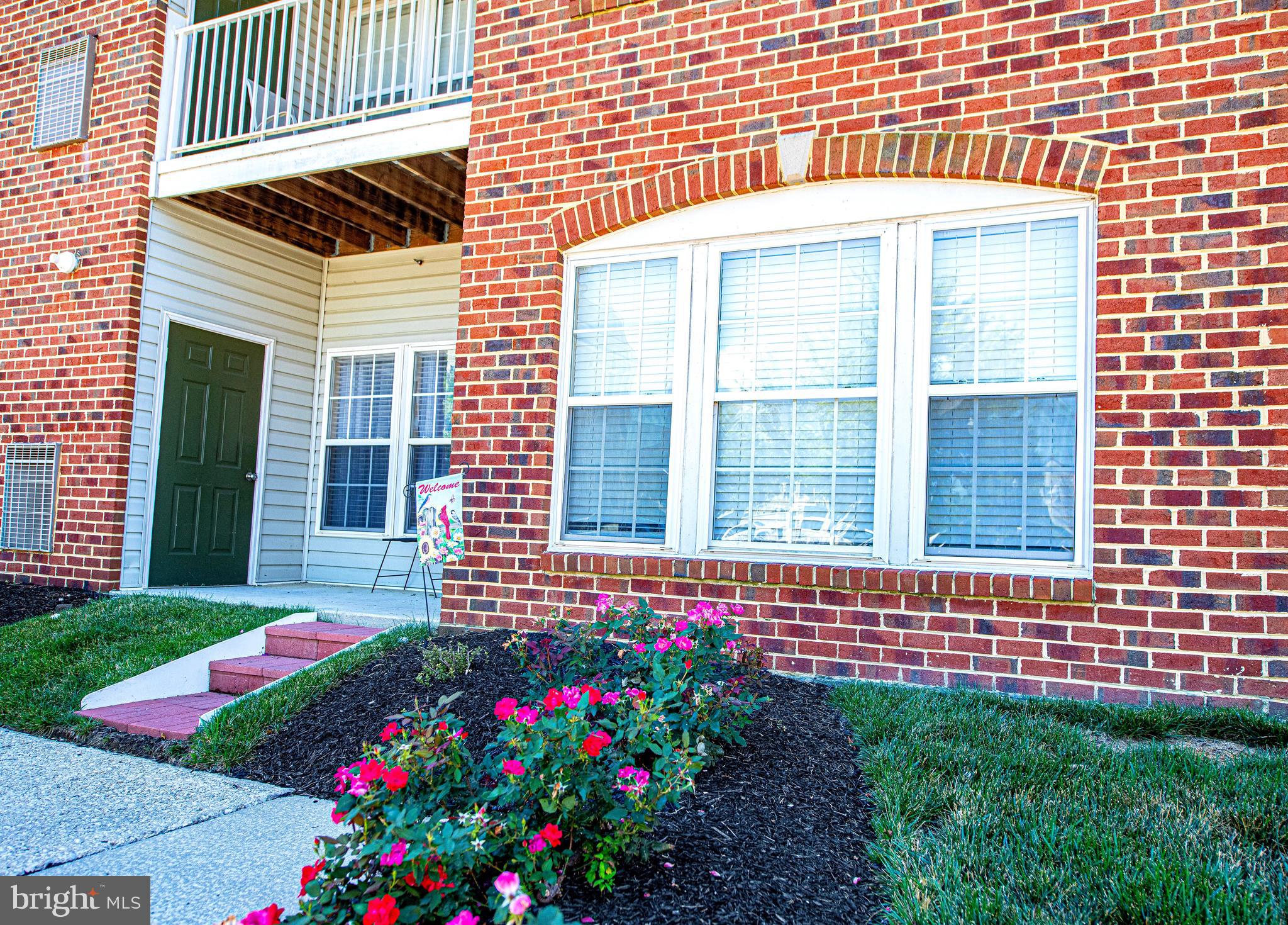 Professional photos coming soon!  Beautifully updated first-floor condo in the highly sought-after gated community of Bulle Rock! The private covered porch is adorable and offers an entry door which is super convenient for taking your furry friends for a walk or just sipping your morning coffee. This spacious 2-bedroom, 2-bath home features an open-concept floor plan, beautiful LVP flooring throughout the home.  Enjoy the bright living room, dining area, updated kitchen with stainless steel appliances, and convenient laundry room. The generous primary suite offers a sitting area, walk-in closet, and a newly remodeled and gorgeous private bath. 

Bulle Rock residents enjoy resort-style living with indoor and outdoor pools, fitness center, tennis and pickleball courts, restaurant, billiards room, library, meeting rooms, walking trails, and more. Low-maintenance living at its finest—schedule your showing today!