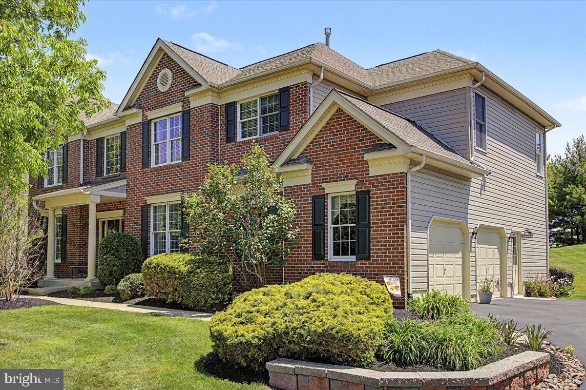 Welcome to this beautifully maintained Jefferson model offering 4 bedrooms, 2.5 baths in the highly desirable Buckingham Forest community. This brick front home within the Central Bucks SD is complimented  by lush landscaping, creating an inviting first impression as you arrive home.
Step inside to gleaming hardwood floors and a dramatic two-story foyer. To the right, the formal dining room has a stunning picture window, creating an elegant setting for everyday meals or special gatherings. To the left, a private study with glass French doors offers the ideal space for working from home while enjoying peaceful front-yard views.
Straight ahead, the light-filled great room serves as the heart of the home, featuring a cozy gas fireplace and an abundance of windows that fill the space with natural light throughout the day. The adjoining kitchen is designed for both everyday living and entertaining, showcasing a two-tier granite island perfect for meal preparation, casual dining, or gathering with family and friends. The extended breakfast area overlooks breathtaking views through a large picture window, where spectacular morning sunrises and colorful evening sunsets become part of your daily routine. An added lifestyle bonus is the home's walkability to Wanda's Farmstead, where you can enjoy fresh seasonal produce, home-baked goods, flowers, spreads, salsas, and more; an amenity that truly sets this location apart.
Convenience continues with a main-level laundry room, powder room, side entry, and access to the attached two-car garage, making daily routines effortless.
Upstairs, you'll find four spacious bedrooms and two full baths. Three generously sized secondary bedrooms are thoughtfully situated on one side of the home and share a full hall bath. Privately tucked away, the expansive owner's suite begins with a large walk-in closet, allowing for a more open and spacious bedroom design. A comfortable sitting area creates the perfect retreat for relaxing with a good book, while the  ensuite bath features on-trend, warm tones, a garden soaking tub, separate stall shower, and the peaceful atmosphere you've been looking for at the end of the day.
The unfinished basement offers exceptional versatility with Bilco doors providing direct outdoor access.  Whether you envision additional storage, a home gym, recreation space, sports practice area, or future finished living space, this lower level is ready to meet your needs. A generator offers a sense of security when Mother Nature throws us a curve ball.
Outdoor living is equally impressive. A custom brick , wood-burning fireplace creates a warm and inviting gathering space for cool evenings spent entertaining friends, sharing stories with family, or simply unwinding in the comfort of your own backyard retreat.
With beautiful living spaces, abundant natural light, incredible views, exceptional outdoor amenities, and a location that blends convenience with small-town charm, this Buckingham Forest home offers the perfect place to call home. Love where you live!

Close proximity to Doylestown, New Hope, restaurants, shopping and travel routes.