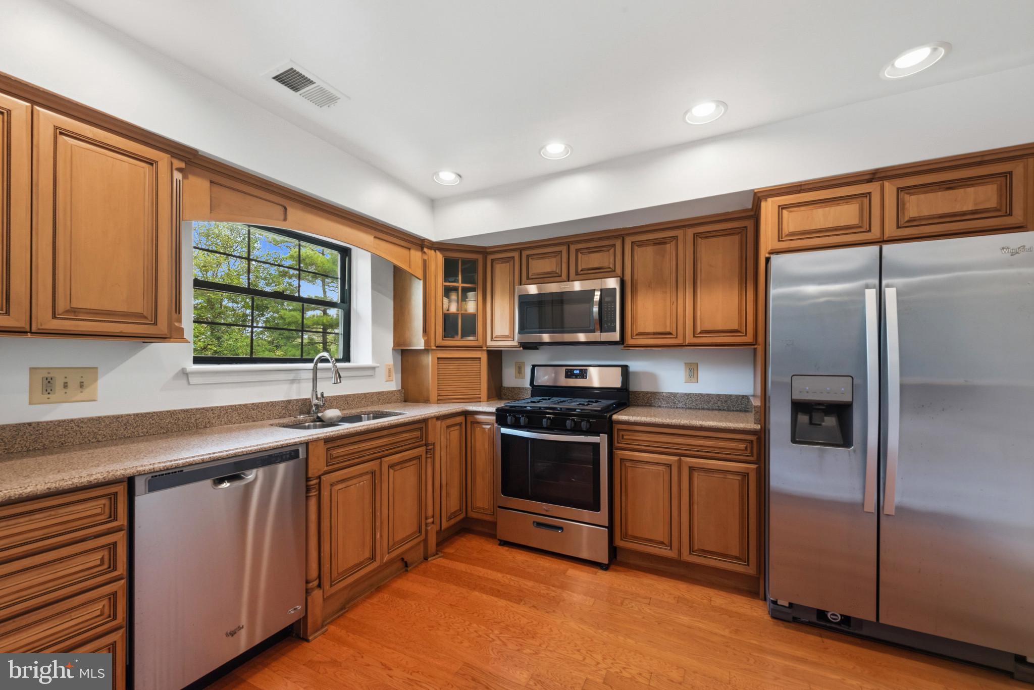 Welcome to this beautifully maintained 2-bedroom, 2-bath condominium in the highly desirable gated Dulaney Valley Gardens Community. This condo features a spacious, light-filled floor plan, generously sized bedrooms, an in-unit washer and dryer, assigned parking, and a private setting overlooking green space. The condo fee includes water and hot water, adding convenience and value to low-maintenance living. Residents enjoy exceptional community amenities, including an outdoor pool, tennis and basketball courts, a playground, and beautifully landscaped grounds. Ideally located just minutes from Dulaney Plaza, GBMC, St. Joseph Medical Center, Towson University, and major commuter routes including I-695 and I-83, this property offers the perfect blend of comfort, convenience, and low-maintenance living. Don't miss this opportunity to own in one of Towson's most sought-after gated communities!