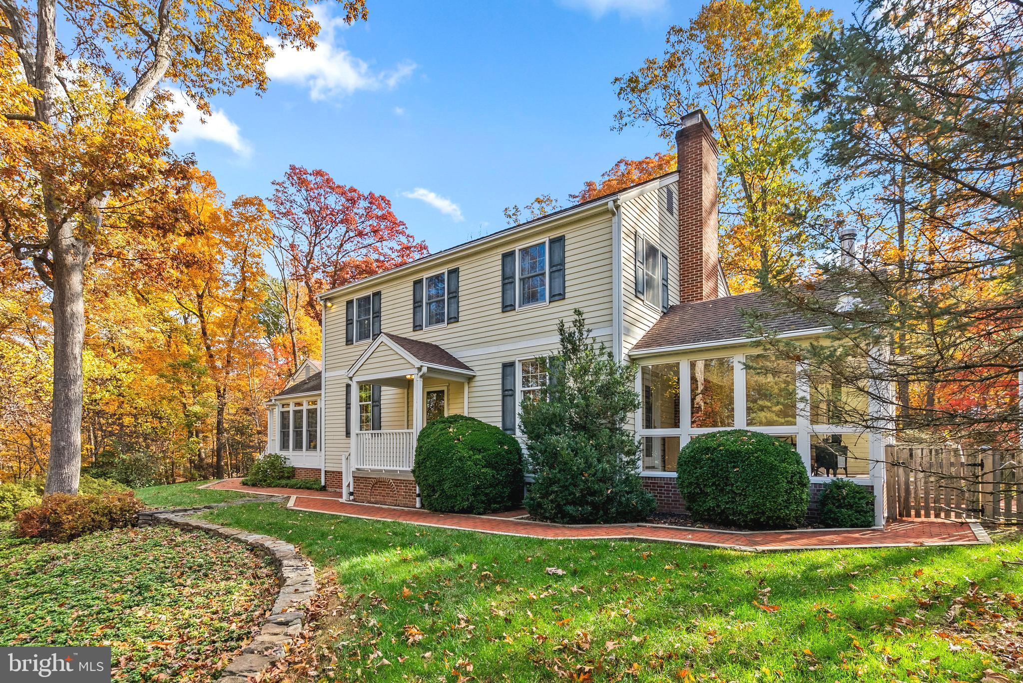 Welcome to 15720 Comus Road, a truly unique custom-built Williamsburg-designed retreat nestled on 3.35 picturesque acres. Lovingly maintained by its original owner and beautifully refreshed for the market. This exceptional home offers over 5,350 finished square feet on the main and upper levels, plus a massive 1,821 unfinished square feet on the lower level, ready for your dream gym, theater, workshop, additional living space, or all of the above! 

Bright, open, and sparkling clean, the home has been thoughtfully updated with fresh paint throughout, including ceilings, refinished hardwood floors, updated lighting, refreshed bathrooms and kitchen, plus new door hardware and hinges throughout. Hardwood flooring extends across both the main and upper levels. Amazing views surround the home, with peaceful wooded scenery out nearly every window and no neighbors peering in, so you can truly enjoy the privacy this property offers.

The flexible floor plan was designed for both everyday comfort and entertaining on a grand scale. The expansive family room and stunning morning room flow seamlessly off the kitchen, creating an incredible gathering space with walls of windows overlooking the serene property. The kitchen is a dream for cooking, hosting, and busy households alike, featuring two ovens, two sinks, breakfast bar seating, a fireplace, and an enormous walk-in pantry.

One of the home’s standout features is the rare dual-primary-suite layout, with a spacious primary ensuite on both the main and upper levels. Upstairs also features three additional generously sized bedrooms and a hall bathroom.

The main level includes multiple flexible spaces perfect for home offices, formal dining, rec room, hobbies, or playrooms. A large living room with fireplace opens to the serene sunroom, creating the perfect place to relax and take in the surrounding nature.

Outside, the beautifully landscaped grounds feel like your own private park, complete with mature trees, scenic views, terraced garden areas, and a newly installed brick walkway that wraps around the property. Enjoy the new deck overlooking the backyard, plus a shed with electricity offering great space for hobbies, storage, workshop space, or gardening needs. For added peace of mind, 
 the home is also equipped with a whole-house generator. 
Car enthusiasts, hobbyists, and creatives will love the oversized 3-car garage with stairs leading to an incredible project space above the garage, offering amazing potential for storage, workshop space, studio space, or future expansion. Additional highlights include a huge mudroom and laundry room, dual staircases to the lower level, and endless flexibility throughout the home.
The sellers have been proactive with recent testing and maintenance. The well water was tested, the septic system was inspected and pumped, and the radon test was completed, with receipts available.

Surrounded by nature yet still conveniently close to everything Clarksburg has to offer, this one-of-a-kind property delivers the perfect blend of privacy, space, beauty, and functionality.