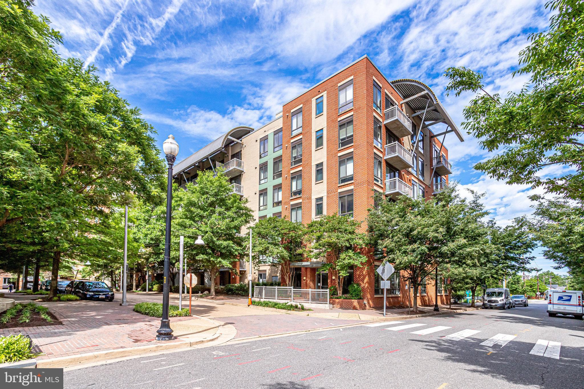 Welcome to unit #504 at The Hartford - a move-in ready gem in the heart of Clarendon! This pristine 1 bed/1 bath condo offers an updated kitchen with a gas range, modern bathroom, in-unit washer/dryer, private balcony, gas fireplace, and 1 assigned parking space. Picture cozy evenings by the fire with hot chocolate or mornings on the balcony with your favorite beverage. With a walkability score of 98, it is just a block away from all that the heart of Clarendon has to offer - dining, bars, groceries, shopping, and the metro. With the added perk of a reserved parking space, convenience and peace of mind are guaranteed. Plus, pet owners rejoice - pets are allowed, and a dog park is conveniently located right beside the building, ensuring your furry friends have space to roam. Schedule a tour today and experience the perfect blend of convenience, charm, and pet-friendly perks firsthand!
