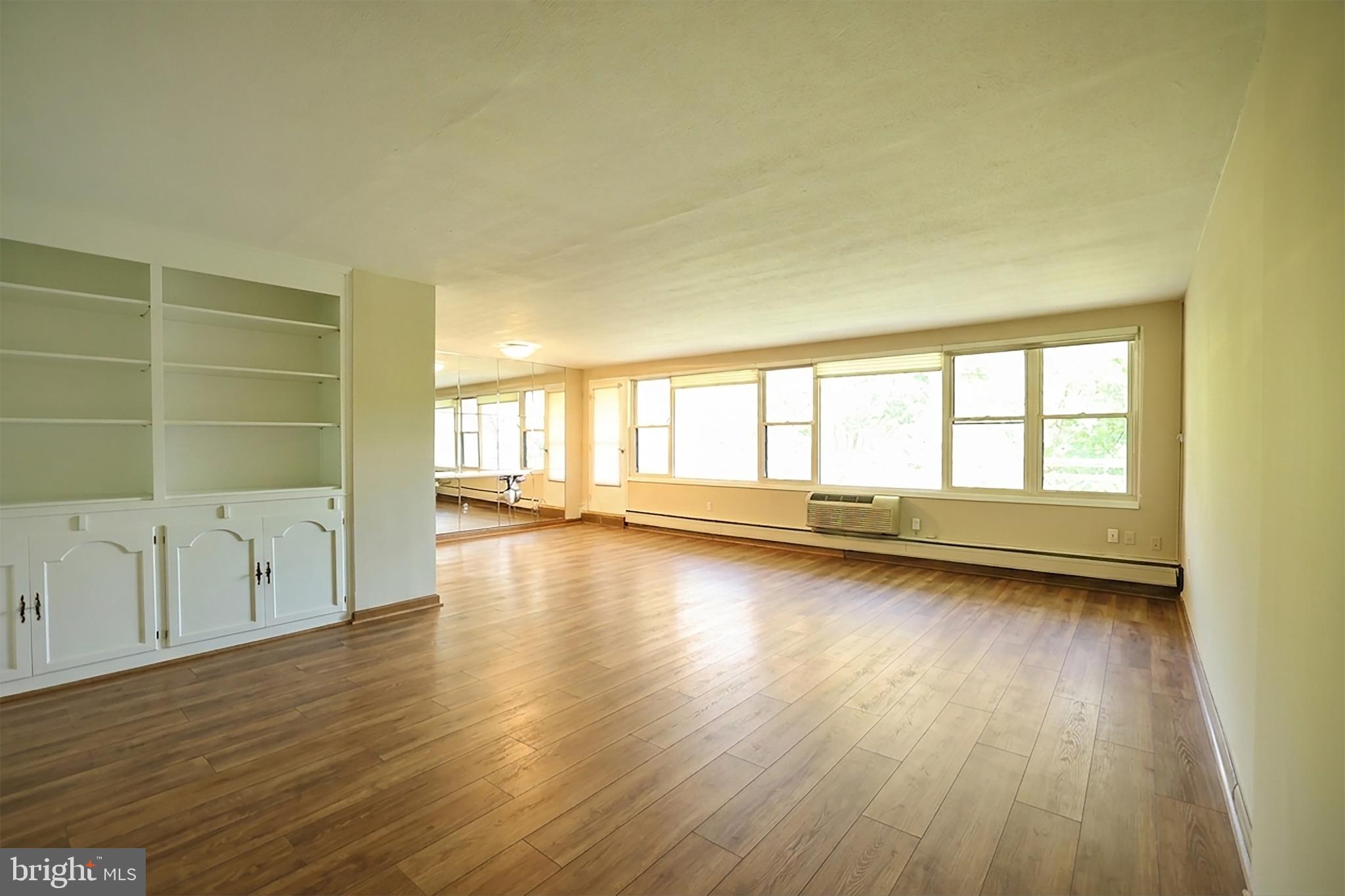 Welcome to this well maintained 2 bedroom, 2 bath condo in Elkins Park, where comfort meets convenience. This spacious unit features a functional kitchen, an open concept living and dining area, and a private balcony perfect for relaxing or entertaining. The primary suite offers ample closet space and a private en suite bath, while the second bedroom is ideal for guests or a home office. Enjoy low maintenance living in a full service building with 24 hour security, on site management, and available parking. Conveniently located near shopping, dining, public transportation, and major roadways, this home offers easy access to everything Elkins Park and the surrounding area have to offer. Do not miss this opportunity. Schedule your showing today.