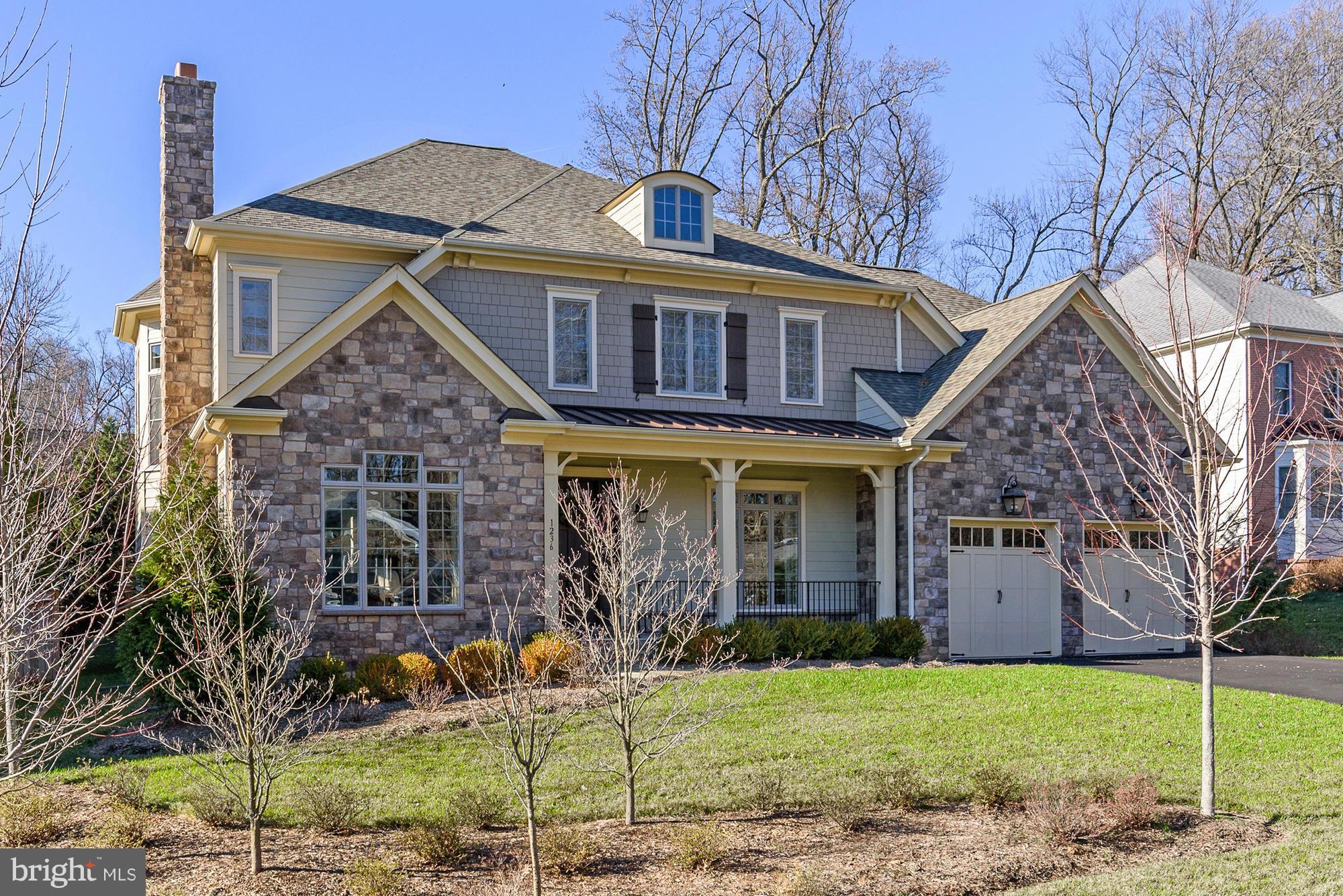 Exceptional 5 bedroom, 5.5 bath residence within walking distance to restaurants and shops in downtown McLean! Fabulous white kitchen with white Carrara marble countertops and breakfast room opening to large family room with coffered ceilings. 10' ceilings throughout main level. Exquisite master suite with elegant master bath. All bedrooms with en suite baths. Fully finished lower level.