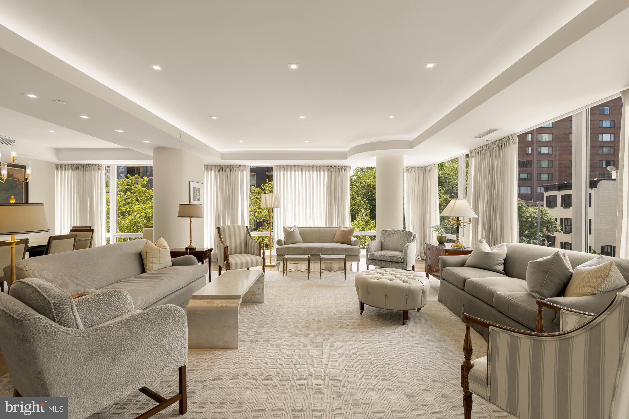 Residence 3A at The Ritz-Carlton Residences — 2,771 square feet, southwest corner, rarely offered and reimagined from the studs.
A corner residence at The Ritz-Carlton rarely comes to market, and this one arrives unlike any before it. Over a meticulous two-year renovation, the current owners enlisted architect and interior designer Jerry Harpole and Fine Point Construction to rebuild the home entirely — architecture and interiors conceived as a single, seamless vision in a refined traditional style. Every detail was considered. Everything is new.
Spanning 2,771 square feet, the residence opens onto a southwest-facing wall of glass that fills the corner with afternoon and evening light, framing open city views and two private terraces. Three bedrooms plus a den offer generous, flexible living, anchored by an exquisite kitchen designed for both everyday life and entertaining. Custom electric shades and drapery run throughout, alongside bespoke millwork and finishes that reflect a level of craftsmanship impossible to replicate.
The offering includes two parking spaces — a true rarity at this address.
Residents enjoy the full measure of Ritz-Carlton living: 24-hour concierge and door service, valet parking, and direct access to the adjoining Sport & Health club and spa. Steps from the West End, Georgetown, and the Kennedy Center, with the boardrooms of downtown minutes away.
A turnkey, once-in-a-cycle opportunity to own the best-positioned residence in the building.