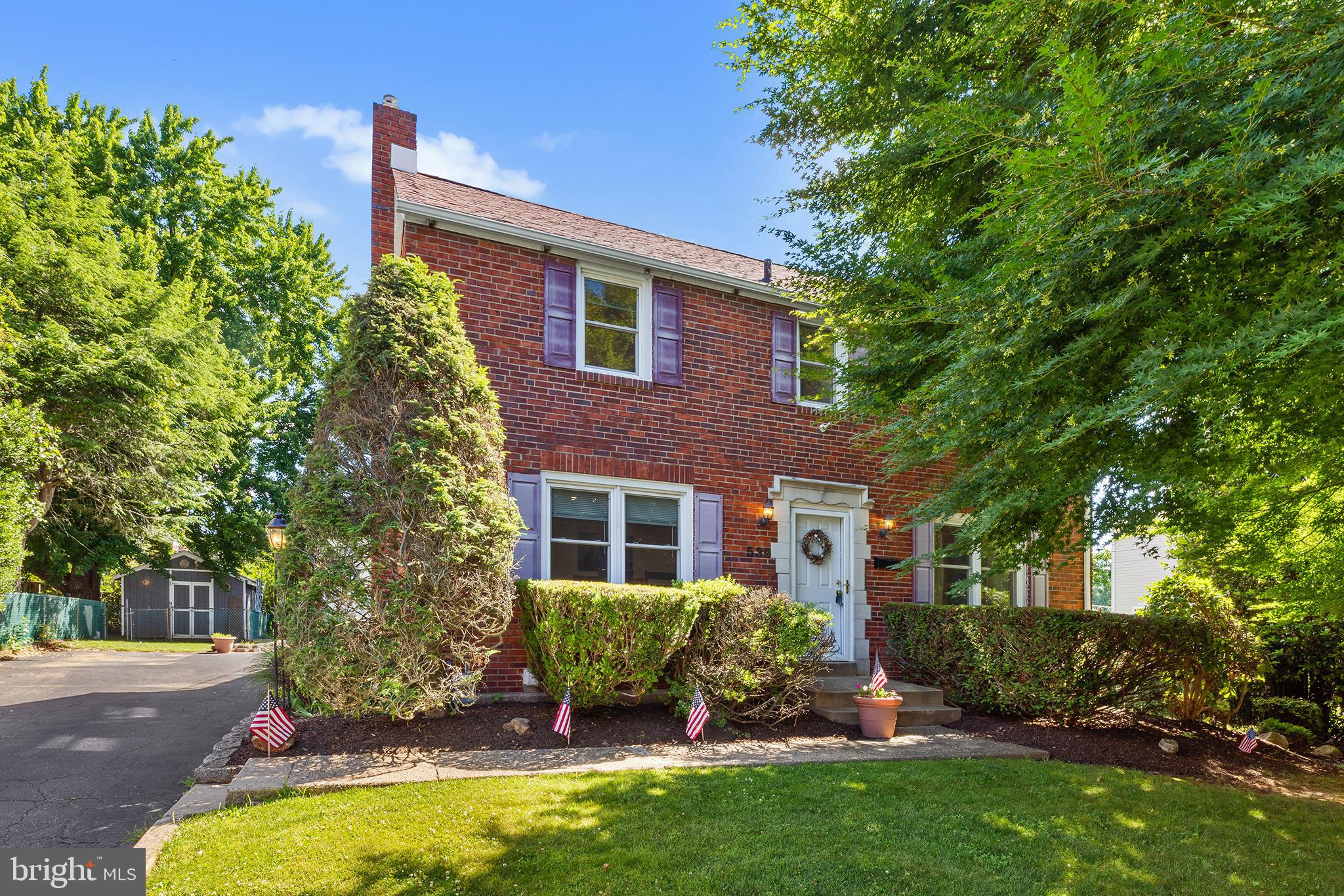 539 E. Scenic Rd. is a beautifully maintained 4-bedroom, 3-full-bath brick home located in the highly sought-after Colonial Park neighborhood of Springfield. Enter through the front door into the spacious living room, featuring a light neutral color palette, matching neutral carpeting, and a large picture window that fills the space with an abundance of natural light, creating a warm and inviting atmosphere. 
Just off the living room is the newly redesigned wraparound eat-in kitchen, featuring luxury vinyl plank flooring, beautiful built-in cherry cabinetry with abundant countertop space and ample storage, stylish tile backsplash, recessed lighting, and front-facing windows that bring in plenty of natural light. Toward the rear of the kitchen, you'll find stainless steel appliances, additional cabinetry and countertop workspace, as well as access to the charming rear addition and the staircase leading to the finished lower level, offering excellent flexibility. 
The spacious family room addition features beautiful hardwood floors, recessed lighting, an overhead ceiling fan, and a convenient exterior door leading to the driveway. Sliding glass doors provide seamless access to the backyard patio and pool area, creating the perfect space for both everyday living and entertaining. 
The finished lower-level features brand-new neutral carpeting and small windows that allow natural light to filter into the space. Versatile and functional, it is ideal for a home office, game room, playroom, or additional living area. Continuing through the lower level, you'll find a dedicated laundry area complete with countertops, cabinetry for extra storage, and the home's mechanical systems, including a newer tankless water heater. A full bathroom completes this level, adding convenience for family and guests alike. 
A convenient coat closet is located on the landing before heading upstairs. At the top of the stairs, you'll find the spacious primary suite, featuring high ceilings, luxury vinyl plank flooring, recessed lighting, and a ceiling fan. For added comfort, the room is equipped with its own wall-mounted split HVAC unit, providing efficient heating and cooling year-round.
The walk-in closet offers an exceptional organizational system with custom shelving and storage, as well as a dedicated laundry area for added convenience. The closet flows seamlessly into the private primary bathroom, which features a new tile floor, walk-in shower, and newer vanity, creating a comfortable and functional owner's retreat.
Three additional bedrooms are located on the upper level, each offering windows for natural light, closet space, and original hardwood flooring beneath the carpet, providing timeless character and future potential as well as a full bath featuring tile floor, vanity and tub/shower combination.
The fully fenced backyard serves as a private oasis, highlighted by an in-ground pool surrounded by a spacious cement patio with ample room for entertaining, relaxing, and summer gatherings. A pool house adds both charm and convenience, offering the perfect retreat to step out of the sun and store pool essentials
A detached single-car garage provides ample additional storage and convenience. 
Situated on a picturesque street within the award-winning Springfield School District, this home offers easy access to nearby parks, shopping, dining, and major commuter routes, making it an ideal location for everyday living and commuting