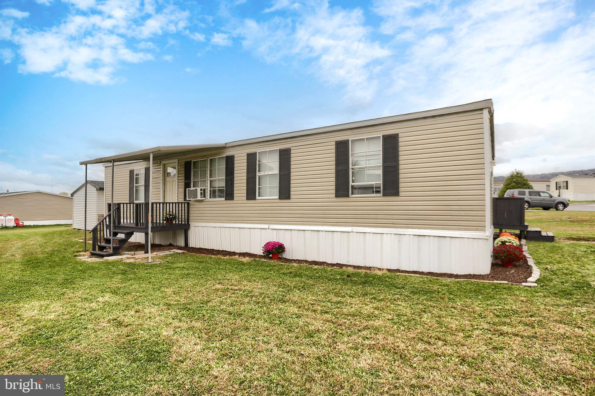 Move-in ready with upgrades galore! Welcome to 292 Dallas Drive, a beautifully updated 3-bedroom, 2-bath double-wide home located in the peaceful Grantville Commons community. This spacious 1,248 sq ft residence, built in 1993, offers comfort, convenience, and a host of modern enhancements that make it truly stand out.

Step inside to discover a freshly upgraded interior featuring a walk-in shower, custom blinds, and closet organization systems designed for optimal storage. The home is equipped with a new refrigerator, washer, and dryer, along with two mock fireplace space heaters that add cozy ambiance. Stay cool year-round with window A/C units and two portable A/C units included.

Outside, enjoy the benefits of a large shed for additional storage and a well-maintained lot with off-street parking. The sale includes living room furnishings (sofa, hassock, TV and stand), a new primary bedroom suite, and a kitchen island with stools—making this home truly turnkey.

Located just minutes from Hollywood Casino and Penn National Race Track, this property offers both tranquility and entertainment nearby.  SELLER IS OFFERING  TO PAY FOR 24  MONTHS @ 1/2 of Lot fees per month  or $434.50 per month, with an acceptable offer.   Total seller is offering over the 24 month period is $10,428.    Any increases to monthly fees over the 24 months will be the responsiblity of new owners.  Grantville Commons community fees total $869.00/month, which includes: (this is for the new owners)

Base rent: $777.00
Sewer: $65.00
Stormwater: $9.63
Trash: $17.39

Whether you're downsizing or looking for a stylish, low-maintenance home in a welcoming neighborhood, 292 Dallas Drive is a must-see!