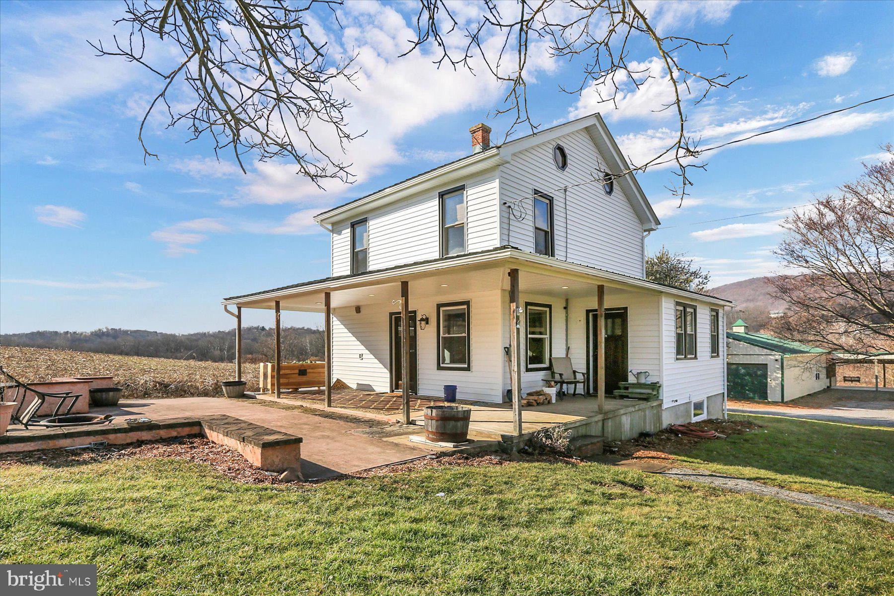Don't miss this unique opportunity! This stunning 21.06-acre property, nestled along the Juniata River with breathtaking views of the Appalachian Mountains, features a fully renovated event barn complete with a commercial kitchen and bar, a charming turnkey farmhouse, and a rare distillery liquor license. This picturesque estate offers endless possibilities, currently operating as a thriving event venue. Imagine a spacious, climate-controlled reception hall embellished with rustic touches, providing a comfortable and stylish setting for events. Explore outdoor options with ample seating and stunning views. Whether you dream of an intimate gathering or a grand celebration, the venue can accommodate various guest sizes. The adjacent farmhouse presents opportunities for a bed-and-breakfast, a bridal or groom suite for the wedding party, or on-site accommodations for a friends-filled weekend. Capture unforgettable photo moments at this must-have location for special occasions.