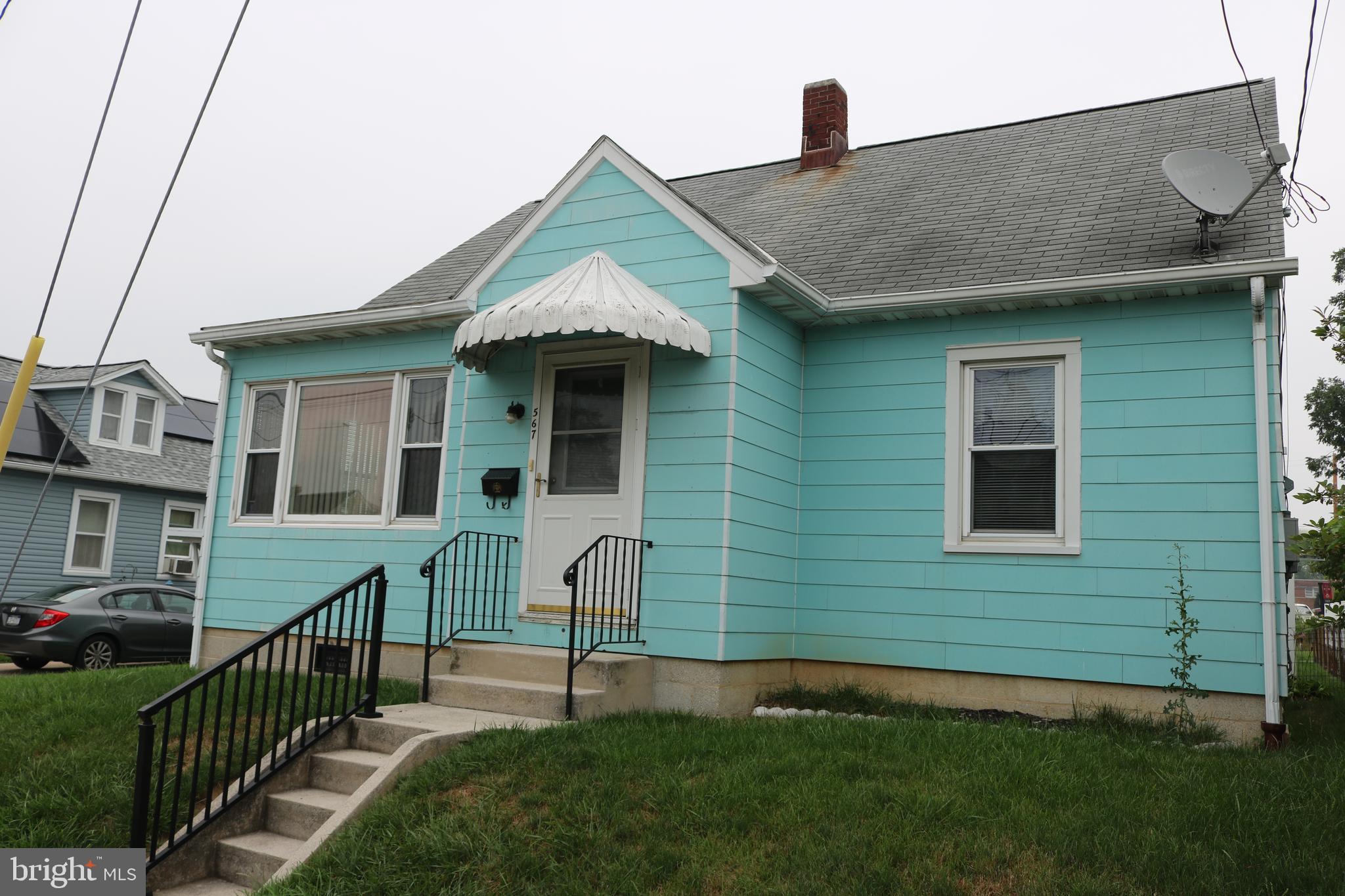 Homeownership begins here! 3 bedrooms, 1 full bath, full basement and appliances included. One car detached garage with plenty of room for storage and a large backyard. Additional offstreet parking off the alley to the rear. Home has hardwood flooring throughout as well as replacement windows. Updated electric,  water heater,  furnace and AC.  Basement has a stall shower and wash tub. First floor laundry could be moved back to basement. Sofa and Bedroom suit could stay if buyer wants.