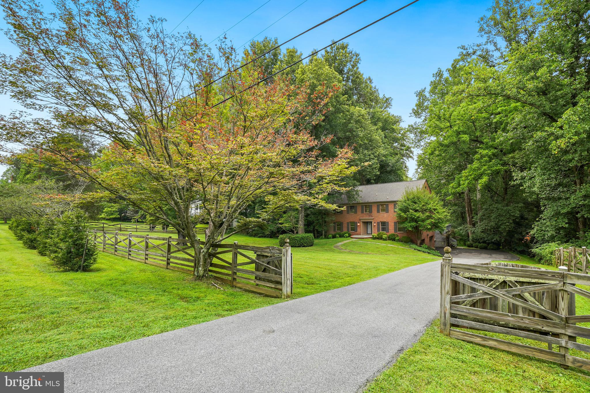 Luxury & Privacy abound at this spectacular, all-brick estate colonial nestled on 2.37 acres backing to mature trees. Spanning three fully finished levels, this wonderful property offers 5 bedrooms, 3 full bathrooms on the upper level, a convenient two-car side-load garage, 2 fireplaces, Kitchen that opens to deck and view of woods, and a fully finished walk-out basement featuring an additional full bath. This rare gem is an absolute must-see.
