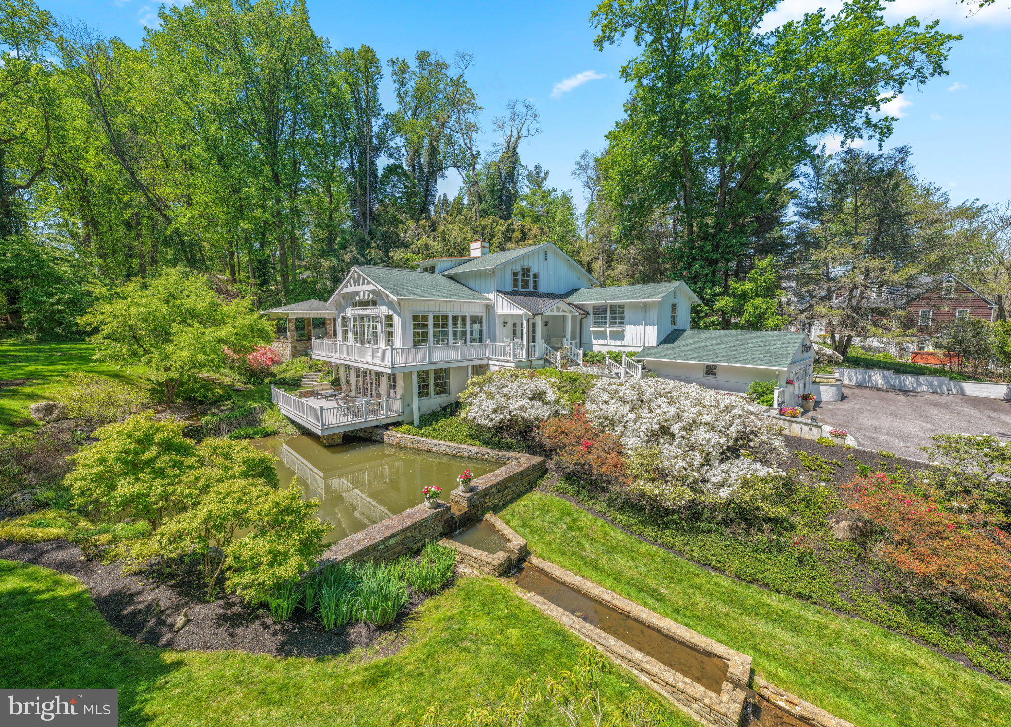 Welcome to 15 Papermill Road, a one-of-a-kind architectural masterpiece perfectly positioned in the serene landscape of Newtown Square. This "lifestyle home" is a true entertainer's dream, offering an unmatched blend of sophisticated design and effortless functionality.
The heart of the residence features an expansive, open floor plan characterized by soaring ceilings and walls of glass that frame the tranquil, wooded setting. The home's unique design is further enhanced by multiple wrap-around decks, providing seamless transitions from nearly every room to the outdoors and offering panoramic views of the lush, private acreage.
The gourmet kitchen is a chef’s delight, transitioning seamlessly to a stunning covered patio equipped with retractable screens—the perfect spot for indoor-outdoor dining. This outdoor oasis overlooks the private, professional-grade putting green, offering a resort-style experience just minutes from the world-renowned Aronimink Golf Club.
The primary bedroom is led by an exquisite primary suite, a true retreat featuring "his and her" walk-in closets and spa-like finishes. Four additional well-appointed bedrooms offer ample space for family and guests. Notably, one bedroom is thoughtfully positioned off a private back staircase, serving as an ideal au pair or in-law suite separated from the main sleeping areas.
The fully daylit, walk-out lower level takes entertaining to the next level. This impressive space features a full bar and a separate, temperature-controlled wine room, all opening directly to a lower deck that integrates perfectly with the lush grounds.
From its grand architectural scale and extensive wrap-around decking to its championship-level amenities, 15 Papermill Road is a rare opportunity to own a home that truly defines the "Championship Lifestyle."
Offered at $1,749,000 Showings begin May 19,2026. Pictures to be uploaded May 4, 2026
• Architectural Style: Contemporary Masterpiece
• Bedrooms: 5 (Including private au pair/in-law suite)
• Key Features: Multiple Wrap-Around Decks, Putting Green, Retractable Screen Patio, Wine Room, Walk-out Lower Level
• Location: Minutes to Aronimink Golf Club, Downtown Wayne, and easy access to the Blue Route