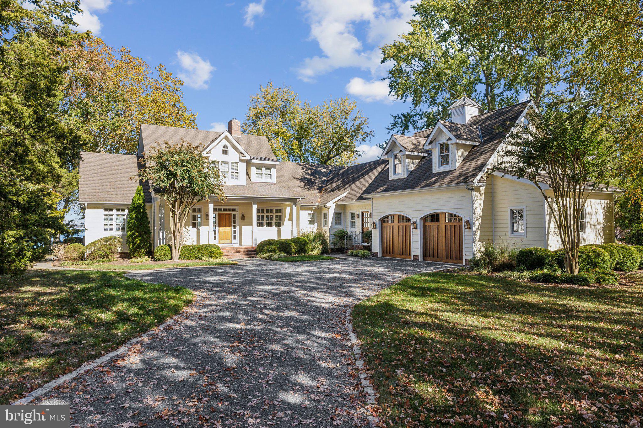 Experience tranquil waterfront living in this stunning 4BR/4.5 BA home sited on .67 acres overlooking the Miles River. Built in 2006, this Craftsman-style home was thoughtfully designed by Lars Erickson and built by Don Foster to blend effortlessly with the beauty of the landscape. The exquisite architectural details are evident throughout and include vaulted ceilings, Australian Cypress flooring, an arched window wall, custom built-ins, and a large dual-sided gas fireplace. The open floor plan offers breathtaking river views from nearly every room and the main living spaces are perfectly suited for family living and entertaining. 

The first floor boasts a gourmet kitchen with high-end stainless and panel-ready appliances, custom cabinetry, granite counters, a wonderful center island, and an adjacent dining area with sweeping waterfront views. Relax by the dual-sided fireplace in the living room, which connects seamlessly to the waterside sunroom. A separate riverside library/office and its adjacent family room with custom built-ins create separate, ideal living and work spaces. The spacious primary suite offers vaulted ceilings, a luxurious ensuite bath with a dual vanity, jetted tub, glass-enclosed walk-in shower, large walk-in closet, and French doors leading to the waterside deck.

Upstairs, two guest bedrooms, each with ensuite bath, a large walk-in cedar closet, and attic access provide additional comfort and convenience.  A separate staircase leads to a lovely private guest bedroom (4th bedroom) with ensuite bath. 

Admire panoramic views of the waterfront, which includes 100' +/- of bulkheaded and riprapped shoreline,  a private dock with boat lift (10,000 lbs.), 2 slips, and 3-3.5' +/- MLW. Completing the property is an oversized attached 2-car garage, providing additional storage and functionality. Minutes to downtown Saint Michaels and a short drive to Easton, this exceptional property combines waterfront beauty and purposeful design in one of Saint Michaels most desirable neighborhoods.
