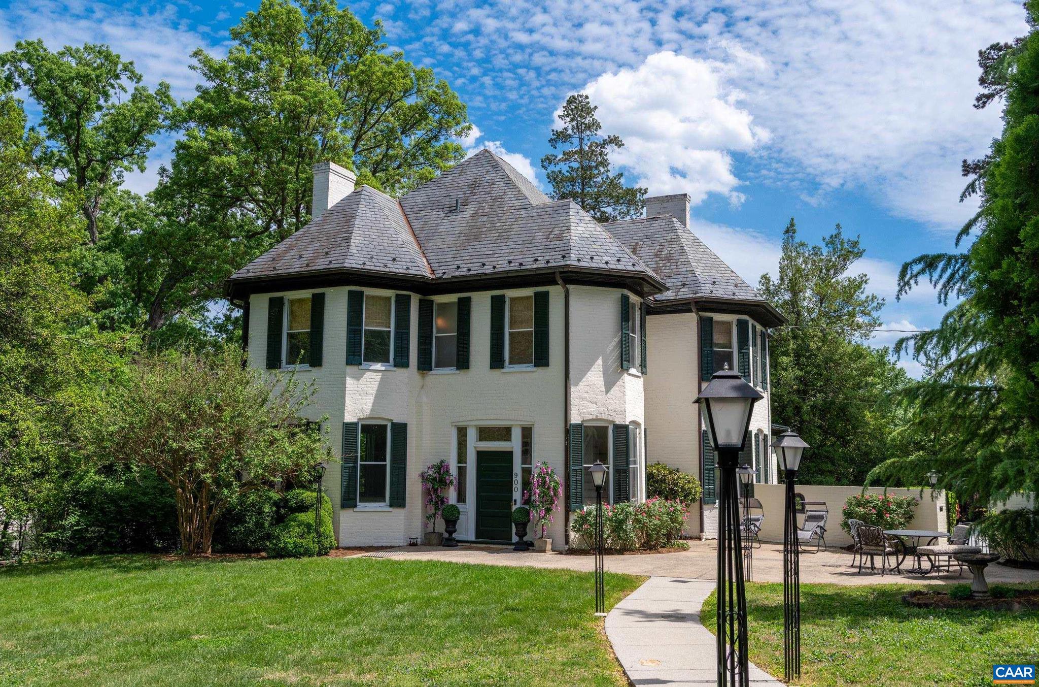 Move-in ready! Located on historic Rugby Road, this stately circa 1896 home offers timeless elegance and modern convenience, all within an easy walk to The Corner, UVA Grounds, Downtown, and Barracks Road Shopping Center. Set on a large lot framed by mature trees and landscaping, the home features flowing, light-filled rooms that capture its rich history and charm. Pocket doors, built-in bookshelves, and crown moldings are just a few of the intricate design details that make this home truly special.,Granite Counter,Wood Cabinets,Fireplace in Bedroom,Fireplace in Dining Room,Fireplace in Living Room,Fireplace in Study/Library