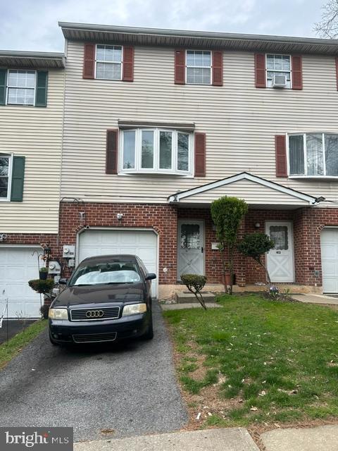 New Price!! Welcome to 415 N. Filbert Street. Step into a welcoming open foyer that flows into a versatile room—ideal as a den, home office, or additional bedroom—complete with a convenient half bath and sliding doors that open to a private fenced yard and direct access to the garage. The second floor features a bright dining area and a well-appointed kitchen that flows seamlessly into a spacious living room, highlighted by a large, newer bay window that fills the space with natural light. A convenient half bath completes this level. The third floor offers a spacious primary bedroom, a full bathroom, and two additional well-sized bedrooms, providing comfortable accommodations for family or guests. This well-maintained home features a newer water heater, a fenced yard, a newer bay window, and newer central air conditioning for year-round comfort. This home also features a private driveway leading to a one-car garage, offering convenient parking and additional storage. This home also has the city’s clear Certificate of Occupancy, providing added peace of mind for the new owner.