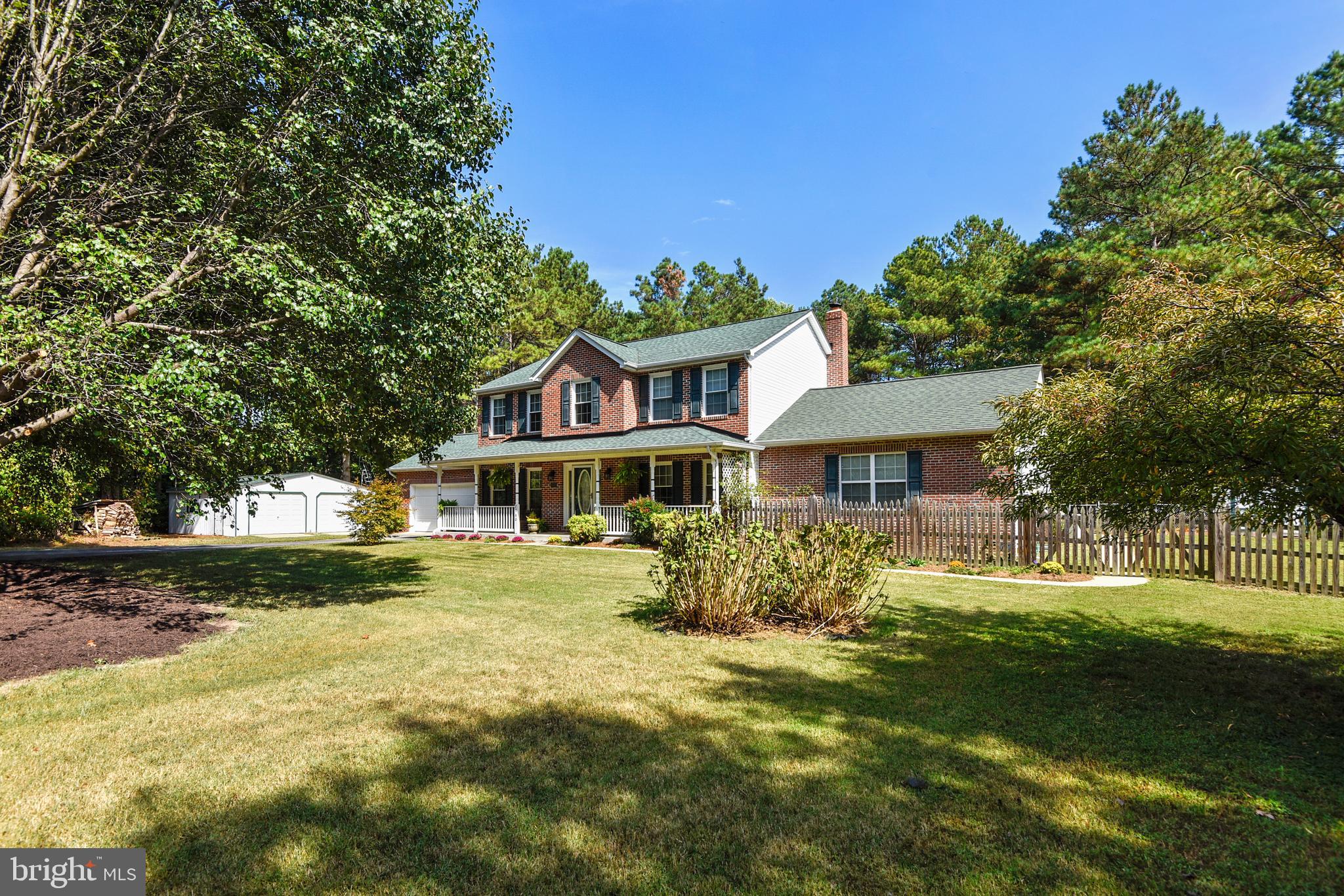 Unique level 3 acre lot!  Brick front colonial with main level in-law suite has sep yard and entrance or access from inside home.  Office space and additional bedroom on main level. Oversize family room off kitchen with view of the spacious, level back yard.  Lots of space for relaxing and entertaining inside and out!  Kitchen boasts large island, granite counters Stainless Steel appliances and 2 pantries. In-law suite with full kitchen to include corian counters and sep laundry could be rental for extra income.  Upper level includes loft area and laundry as well as Master Suite with walk in closet,   soaking tub and sep shower. Within the USDA 100% financing area! Current contract has 72 hr kickout.
