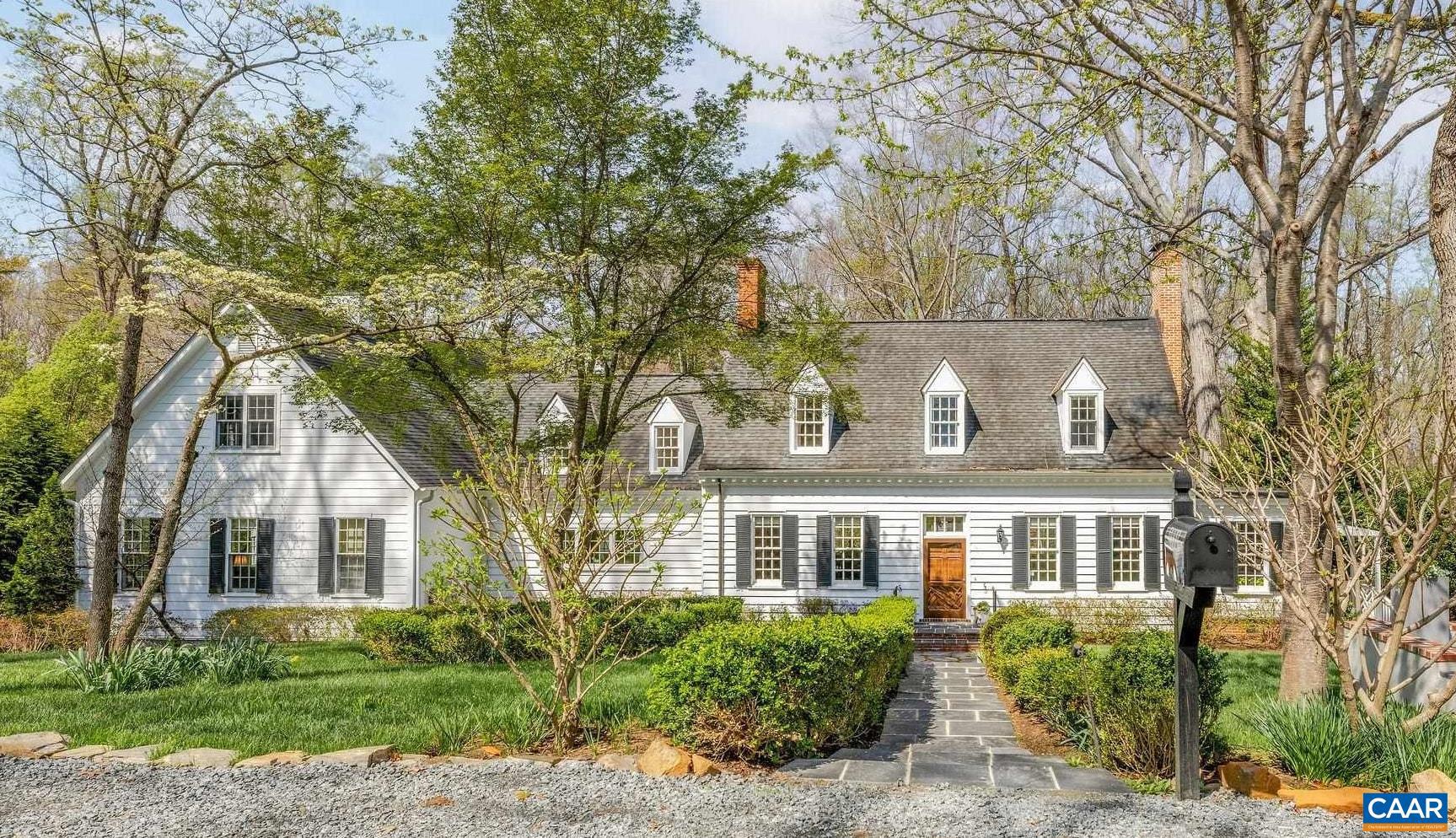 Rare opportunity to own more than an acre of private property in Meadowbrook Hills, just minutes from UVA, Barracks Road shopping and dining, and downtown Charlottesville. This 6 bedroom, 4.5 bath home blends timeless character with thoughtful updates in one of the area?s most sought after locations. A welcoming foyer opens to gracious formal living and dining rooms, while the updated kitchen flows seamlessly to the back deck and expansive yard, creating an easy connection to outdoor living. The family room offers generous space for gathering, and the main level primary suite with renovated bath provides the ease of one level living. Upstairs, 4 bedrooms, 2 full baths, a loft, and laundry offer flexibility for family and guests. The basement is ideal for an au pair or extended stay, featuring a private entrance, bedroom, full bath, and kitchen. Recent improvements include new landscaping, off street parking, a fully renovated guest bath, updated primary bath, and kitchen enhancements.With its rare combination of acreage, privacy, thoughtful updates, and close proximity to Charlottesville?s most desirable amenities, this property presents a unique opportunity to enjoy both space and convenience in an exceptional setting.,Painted Cabinets