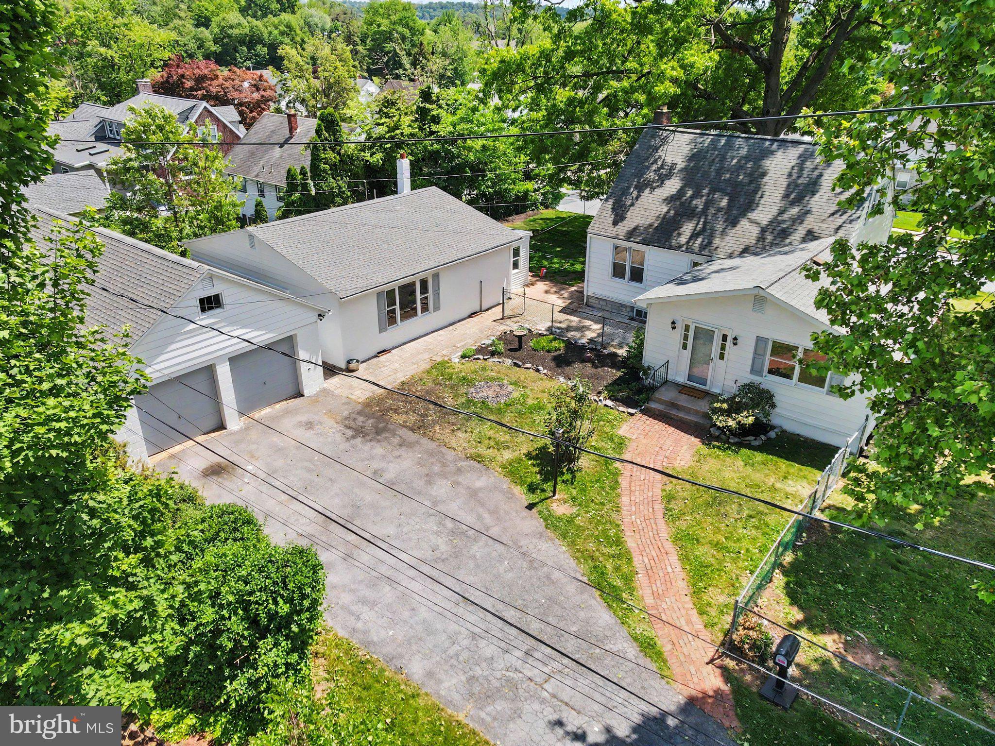 Rarely does a property offer this much versatility,  whether you're a multigenerational family, an investor, or simply someone who wants room to spread out, 105 Oak Hill Drive delivers two fully functional homes on one spacious corner lot. The main residence is a classic Cape Cod brimming with character and move-in ready condition. Featuring 3 bedrooms, 1.5 baths, it includes a large upstairs den that works beautifully as a bedroom or home office, the layout is both flexible and functional. Enjoy a welcoming living room, a separate dining area, and an eat-in kitchen.  The crown jewel of this property is the fully renovated detached ranch-style home, now featuring a brand-new mini-split HVAC system, updated throughout, and completely move-in ready. With its own bedroom and bathroom, this second dwelling is perfect as an in-law suite, a private residence, or a rental unit generating immediate income. It also offers a spacious bathroom with a walk-in shower. Additional highlights include new appliances, a large two-car detached garage with a loft, and a rear storage/workshop — all set on a generous corner lot with mature trees and lush yard space. The possibilities here are truly unique: live in the main house and rent the ranch for passive income, house multiple generations under one address while maintaining privacy, or use the entire property as a compound. All of this in an established Middletown neighborhood close to schools, shopping, and major commuter routes. This is not just a home, it's an investment in flexibility, family, and lifestyle.