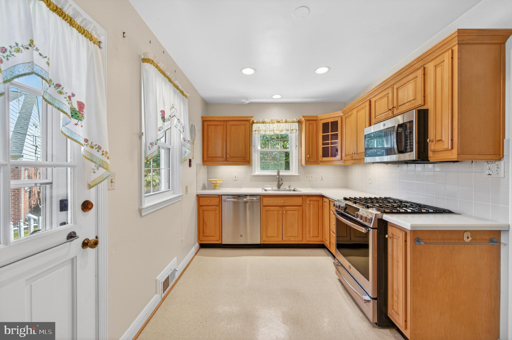Charming brick Cape Cod located in the heart of Towson! Welcome to 506 Dogwood Lane offering 3 bedrooms and 2.5 baths with a perfect blend of classic character and some recent updates throughout. This move-in ready home features gleaming hardwood floors, stainless steel appliances, attractive kitchen cabinetry, and two recently updated full baths. The inviting main level includes a spacious living room with a decorative fireplace, a lovely dining room ideal for gatherings, a main-level bedroom, and a full bath for added convenience. The cozy enclosed side porch creates the perfect space to relax, read, or enjoy your morning coffee. Upstairs you’ll find two generously sized bedrooms with beautiful hardwood floors and an additional updated full bath. The finished basement offers valuable extra living space complete with a half bath and laundry room — perfect for a recreation room, home office, gym, or guest area. Rear parking spot provides added convenience and everyday ease.   Priced to sell and won’t last long!