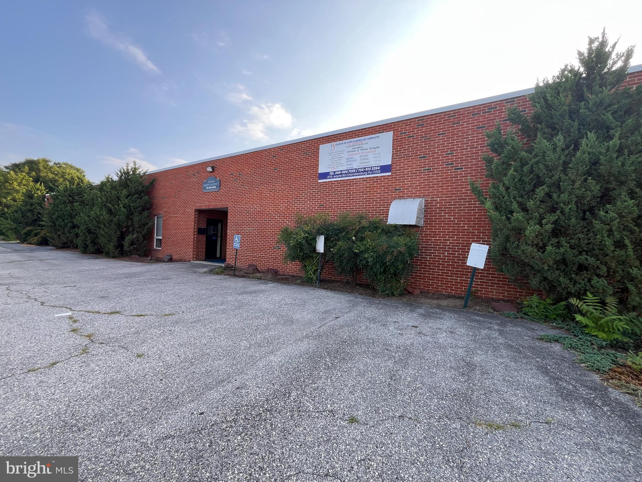 High-traffic, commercially zoned 6.8-acre property offering exceptional visibility and endless potential. Conveniently located just half a mile from Exit 14 on I-81, this prime location ensures easy access and strong traffic flow. This versatile property features a large building currently leased to multiple tenants, providing immediate income and investment stability. The space offers a mix of functionality, with some areas equipped with central A/C while others remain non-conditioned—ideal for a variety of commercial uses. A truck dock is also in place, adding valuable logistics and distribution capability. Perfect for investors or owner-users, the property can continue as a mixed-use, multi-tenant investment or be reconfigured to accommodate a single business entity seeking expansive space and a strategic location. The generous acreage allows for additional development, expansion, equipment storage, or customization to suit numerous commercial applications. Positioned with direct access to I-81 and Route 11, this property delivers outstanding connectivity, visibility, and opportunity. Endless possibilities await—capitalize on the location, flexibility, and scale this unique commercial offering provides.