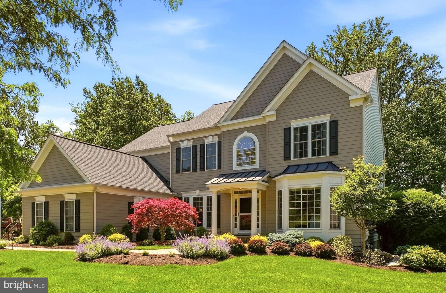 Located in the highly desirable community of Maisfield, this meticulously maintained home sits on a premium 1.27-acre private lot and offers over 5200 square feet of living space with 5 bedrooms and 4 and a half bathrooms. From the moment you arrive, the setting feels like a true escape - surrounded by mature landscaping, framed by seasonal views of Pickering Creek Reservoir, and filled with a sense of calm and space that's increasingly rare. It's all just 3 miles from downtown Phoenixville's Bridge Street shops and dining, and roughly 5 miles from King of Prussia and Turnpike access.

A dramatic two-story foyer welcomes you inside, flanked by a formal living room and dining room. From there, the main level flows into an impressive two-story family room where a gas fireplace anchors the space and walls of windows fill it with natural light. The adjoining kitchen is built for function and entertaining, featuring a center island, breakfast area, walk-in pantry, and seamless flow into the main living spaces. Rounding out the main level are a private study, powder room, a laundry room and access to the 3-car garage.

Just off the living space, a screened-in porch truly brings the outdoors in, overlooking the private backyard and opening to a spacious deck with a gas line for the included Weber grill. Steps down the lower flagstone patio and usable backyard. The entire outdoor living environment was designed specifically to enjoy this peaceful setting.

Upstairs, the spacious primary suite features a renovated bathroom and generous closet. Three additional bedrooms, one with an ensuite bathroom and the other two share a jack and jill bathroom. The finished walkout basement adds exceptional living space, currently configured as a theater and recreation area with an included projector and AV systems, plus a private bedroom and full bath, ideal for guests, multi-generational living, or extended stays.

Thoughtfully improved throughout, the home reflects true pride of ownership. Significant updates include a geothermal heating and cooling system, newer roof (2020), generator (2020), two new heat pumps (2022), many replacement windows, water softener and filtration system (2022), a renovated primary bath and additional bathroom updates. Outdoor enhancements include a widened driveway, expansive deck and screened-porch addition, patio improvements, grading and landscaping upgrades, and mature professional landscaping that enhances both privacy and curb appeal.

With timeless quality, generous space, private views, and beautiful outdoor amenities just minutes from shopping, dining, recreation, and corporate centers, this is a rare opportunity to own one of Maisfield's premier lots.