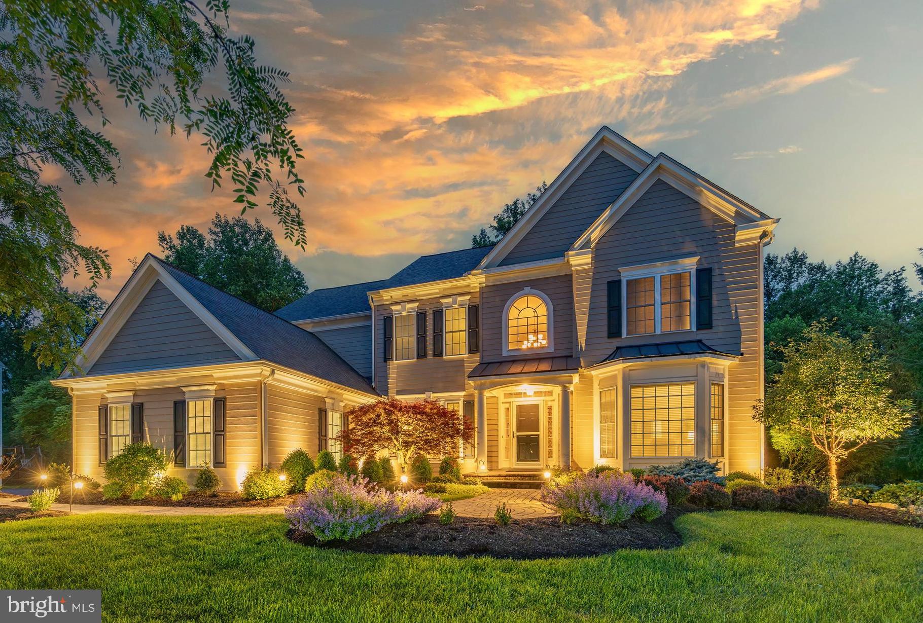 Located in the highly desirable community of Maisfield, this meticulously maintained home sits on a premium 1.27-acre private lot and offers over 5200 square feet of living space with 5 bedrooms and 4 and a half bathrooms. From the moment you arrive, the setting feels like a true escape - surrounded by mature landscaping, framed by seasonal views of Pickering Creek Reservoir, and filled with a sense of calm and space that's increasingly rare. It's all just 3 miles from downtown Phoenixville's Bridge Street shops and dining, and roughly 5 miles from King of Prussia and Turnpike access.

A dramatic two-story foyer welcomes you inside, flanked by a formal living room and dining room. From there, the main level flows into an impressive two-story family room where a gas fireplace anchors the space and walls of windows fill it with natural light. The adjoining kitchen is built for function and entertaining, featuring a center island, breakfast area, walk-in pantry, and seamless flow into the main living spaces. Rounding out the main level are a private study, powder room, a laundry room and access to the 3-car garage.

Just off the living space, a screened-in porch truly brings the outdoors in, overlooking the private backyard and opening to a spacious deck with a gas line for the included Weber grill. Steps down the lower flagstone patio and usable backyard. The entire outdoor living environment was designed specifically to enjoy this peaceful setting.

Upstairs, the spacious primary suite features a renovated bathroom and generous closet. Three additional bedrooms, one with an ensuite bathroom and the other two share a jack and jill bathroom. The finished walkout basement adds exceptional living space, currently configured as a theater and recreation area with an included projector and AV systems, plus a private bedroom and full bath, ideal for guests, multi-generational living, or extended stays.

Thoughtfully improved throughout, the home reflects true pride of ownership. Significant updates include a geothermal heating and cooling system, newer roof (2020), generator (2020), two new heat pumps (2022), many replacement windows, water softener and filtration system (2022), a renovated primary bath and additional bathroom updates. Outdoor enhancements include a widened driveway, expansive deck and screened-porch addition, patio improvements, grading and landscaping upgrades, and mature professional landscaping that enhances both privacy and curb appeal.

With timeless quality, generous space, private views, and beautiful outdoor amenities just minutes from shopping, dining, recreation, and corporate centers, this is a rare opportunity to own one of Maisfield's premier lots.