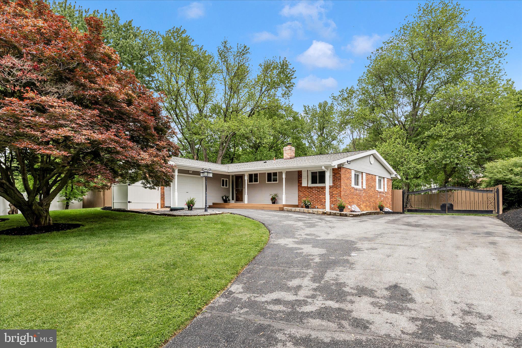 NEWLY RENOVATED!! Enjoy easy living here on Sunnyview Drive. NEW kitchen cabinets, countertops, appliances, and backsplash! FRESHLY painted throughout, NEW doors, NEW floors, updated bathrooms, and more!!! Other recent updates include roof in 2018, deck and slider door 2021, windows and siding (with new insulation) 2021. Sitting on just under a half acre, enjoy an oversized driveway for plenty of parking, plus one car garage, ideal back yard with full privacy fence, and oversized deck with added coverage! Backing to nature preserve! Perfect for entertaining, playing, or gardening! Kitchen has great cabinet space, plus a walk in pantry! Plenty of counter space for prepping meals! Sunroom off kitchen for enjoying all of the seasons and sunshine!! Large family room for nights at home, and 3 spacious bedrooms plus 2 full bathrooms on the main level. Rebuilt stairs with new craftsman railing lead to the large finished basement, which includes a bonus room for home office or crafts, and separate laundry/utility room! Bonus storage rooms throughout basement as well. This property has been loved and cared for, and every inch updated over the last few years with major remodel this Spring. It is truly ready for YOU to enjoy all of the benefits of owning a spectacular property! NO HOA!! Conveniently located within 1 mile of several bus stops, 3 miles to MARC train, less than 5 minutes to get onto 270, plus all of the wonderful stores and restaurants that Germantown has to offer! Schedule your tour today, you're going to love it!