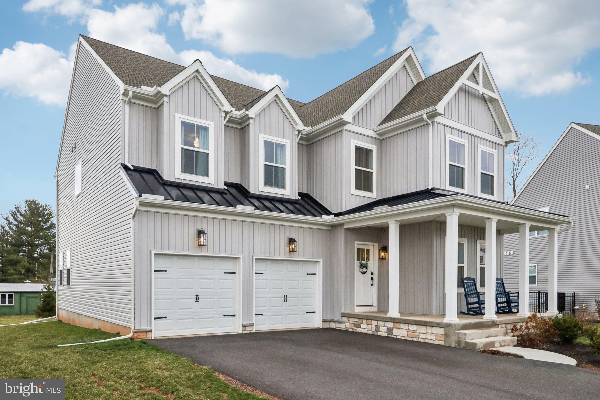 Beautifully crafted 'Keystone Custom Homes' build in this desirable Trappe community.  This home offers 4 bedrooms, 2.5 baths, and thoughtfully designed living spaces throughout.  A charming covered front porch invites you inside, where a bright, welcoming hallway with luxury vinyl plank flooring flows seamlessly across the entire main level. The spacious dining room features a striking linear lantern chandelier and recessed lighting—perfect for both everyday meals and entertaining.  The impressive two-story living room is filled with natural light from upper-level windows and anchored by a stunning stone gas fireplace with a wood mantle and slate hearth. The adjacent kitchen is a true showstopper, complete with quartz countertops, white shaker cabinetry, a hexagon mosaic tile backsplash, stainless steel appliances, a 5-burner gas stove, convection oven and microwave, reverse osmosis water system, French door refrigerator, and a large deep sink. A generous breakfast bar comfortably seats four, while the adjoining breakfast room and sunroom provide additional space to gather or unwind. A private first-floor office/playroom is bathed in natural light from expansive windows, creating an ideal space for working from home or a quiet retreat.  Entering from the garage, you'll appreciate the convenient welcome center—perfect for staying organized—along with a well-appointed powder room that completes the main level.  Upstairs, the primary suite offers a relaxing retreat with 9-foot ceilings, recessed lighting, a ceiling fan, and two very spacious walk-in closets. The luxurious ensuite bath includes a soaking tub, separate stall shower, water closet, double vanity with upgraded hardware and white shaker cabinetry. Three additional generously sized bedrooms—two with walk-in closets—a full hall bath with tub/shower combination, and a convenient upper-level laundry closet complete this level.  The unfinished basement, featuring high ceilings and an egress window, provides endless potential for future living space, a home gym, or additional storage. This exceptional home blends style, comfort, and functionality—don’t miss your opportunity to make it yours.   Ideally situated in the heart of Trappe, this home offers the perfect blend of small-town charm and everyday convenience. Enjoy close proximity to the scenic Perkiomen Trail and numerous parks, providing endless opportunities for walking, biking, and outdoor recreation, while also being just minutes from local shops, dining, and everyday essentials. With convenient access to nearby Collegeville and major roadways, and located within the highly regarded Perkiomen Valley School District, this location truly offers the best of both lifestyle and accessibility.