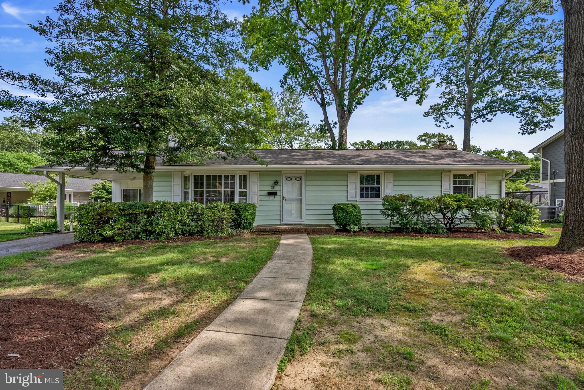 Welcome to the heart of 57 years of cherished memories, a home filled with love, laughter, and family, now ready to begin its next chapter. Nestled on a spacious, level lot in the sought-after Severna Forest community, 812 Cottonwood Drive is a beautifully maintained rancher offering the ease of one-level living, thoughtful updates, and versatile living spaces throughout.
Step inside to discover beautiful hardwood floors, abundant natural light, and a welcoming layout designed for both everyday living and entertaining. The spacious living room flows seamlessly into the dining area and kitchen. Three bedrooms, including a primary suite with a separate bathroom and a newly updated hall bath, provide space for everyone.  Just beyond, a bright and inviting sunroom serves as the heart of the home, featuring walls of windows, a cozy wood-burning stove, and sliding glass doors that open to the backyard, creating the perfect space to relax year-round.
The finished lower level offers exceptional flexibility, with ample space for a recreation room, home office, gym, playroom, media room, or guest space. Additional unfinished space offers abundant storage and utility areas.
Outside, enjoy the large private backyard surrounded by mature trees, complete with a patio, storage shed, and plenty of space for gardening, outdoor gatherings, or simply enjoying the peaceful setting. An extended driveway provides ample off-street parking.
Residents of Severna Forest enjoy access to a voluntary community association featuring a private waterfront dock and kayak storage, offering an opportunity to embrace the area’s water-oriented lifestyle.
Lovingly cared for by the same family for nearly six decades, this special home offers timeless charm, flexible living space, and a wonderful opportunity to become part of an established Severna Park community.