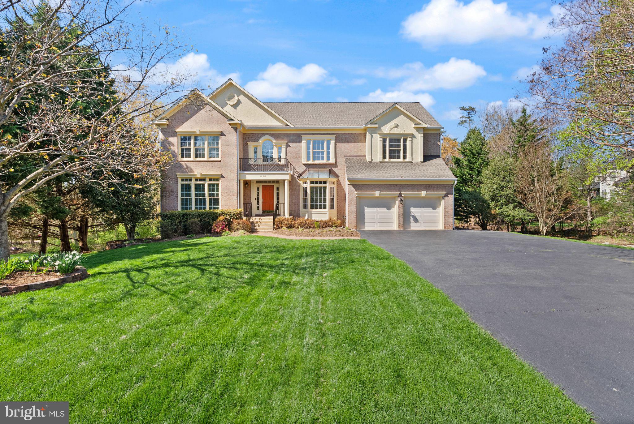 Welcome to this beautifully maintained east- and south-facing single-family home, built in 1994, offering 5 bedrooms, 4.5 baths, and an exceptional blend of space, functionality, and thoughtful upgrades. Flooded with natural light and featuring soaring ceilings, this home delivers both comfort and elegance throughout.
The main level offers a versatile layout with a spacious living room, private office, formal dining room, and an expansive eat-in kitchen that opens to a dramatic two-story great room with a striking brick fireplace. A rare main-level primary suite provides convenience and flexibility, while a second, larger primary suite upstairs offers a true retreat. Both primary bathrooms have been fully renovated (2024 & 2025) with low-threshold glass showers and standalone soaking tubs. Brazilian cherry hardwood floors extend through the main living areas and bedrooms, complemented by ceramic tile in the kitchen and baths.
The kitchen features granite countertops, stainless steel appliances, double ovens, and a center island with electric cooktop—ideal for both everyday living and entertaining. A double staircase connects the foyer and great room to the upper level, enhancing flow and accessibility.
Step outside to a thoughtfully designed outdoor oasis. Enjoy a composite Trex deck (2020) with built-in lighting, a large stone patio, and a paver fire pit area (2015) connected by a raised walkway. The property is beautifully landscaped with mature plantings, multiple garden beds, and a fenced garden with raised beds (2016). Additional exterior upgrades include a paver parking pad (2022), front exterior lighting (2023), irrigation system, underground French drains, gutter guards with warranty, and a full-property Invisible Fence (2025).
Major systems have been updated for peace of mind, including dual HVAC systems (upper level 2025, main level 2021), two water heaters (2025 & 2010), and a sump pump (2021). Roof was replaced in 2018. Front windows are treated with protective tinting to preserve interior finishes. The home also includes a main-level laundry/mudroom with updated appliances, a two-car garage, and a large unfinished basement already plumbed for a future bathroom.
This home offers the perfect combination of indoor comfort, outdoor enjoyment, and long-term value—all in a desirable location near Route 7 and Dulles Toll Road, with easy access to Reston, Leesburg, and McLean! Come take a look at this stunning home in a sought after neighborhood & location before it's gone!
